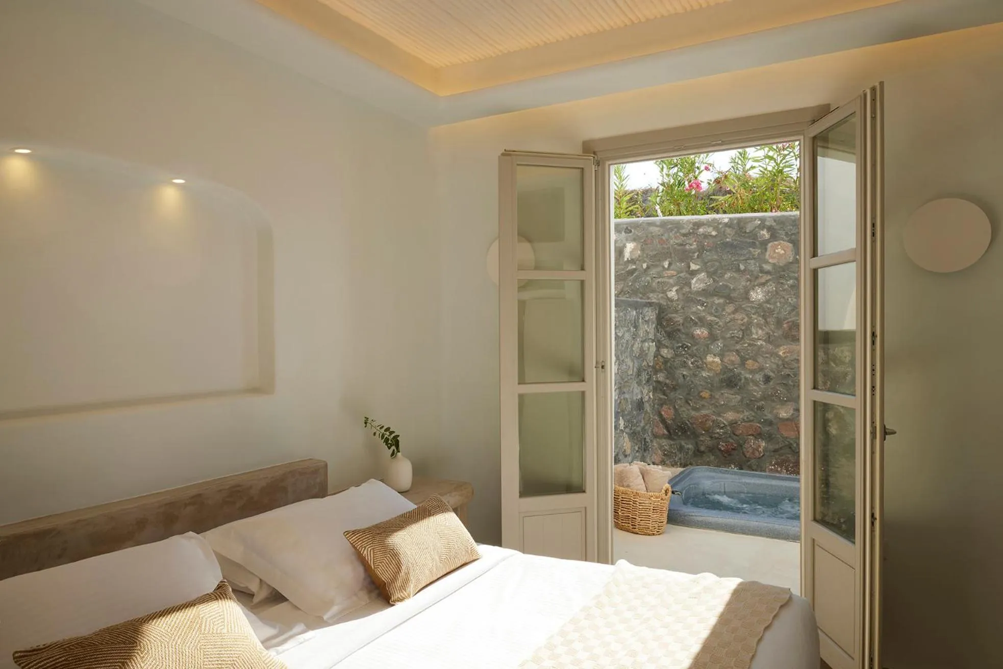 Bed in Danae Suites Santorini