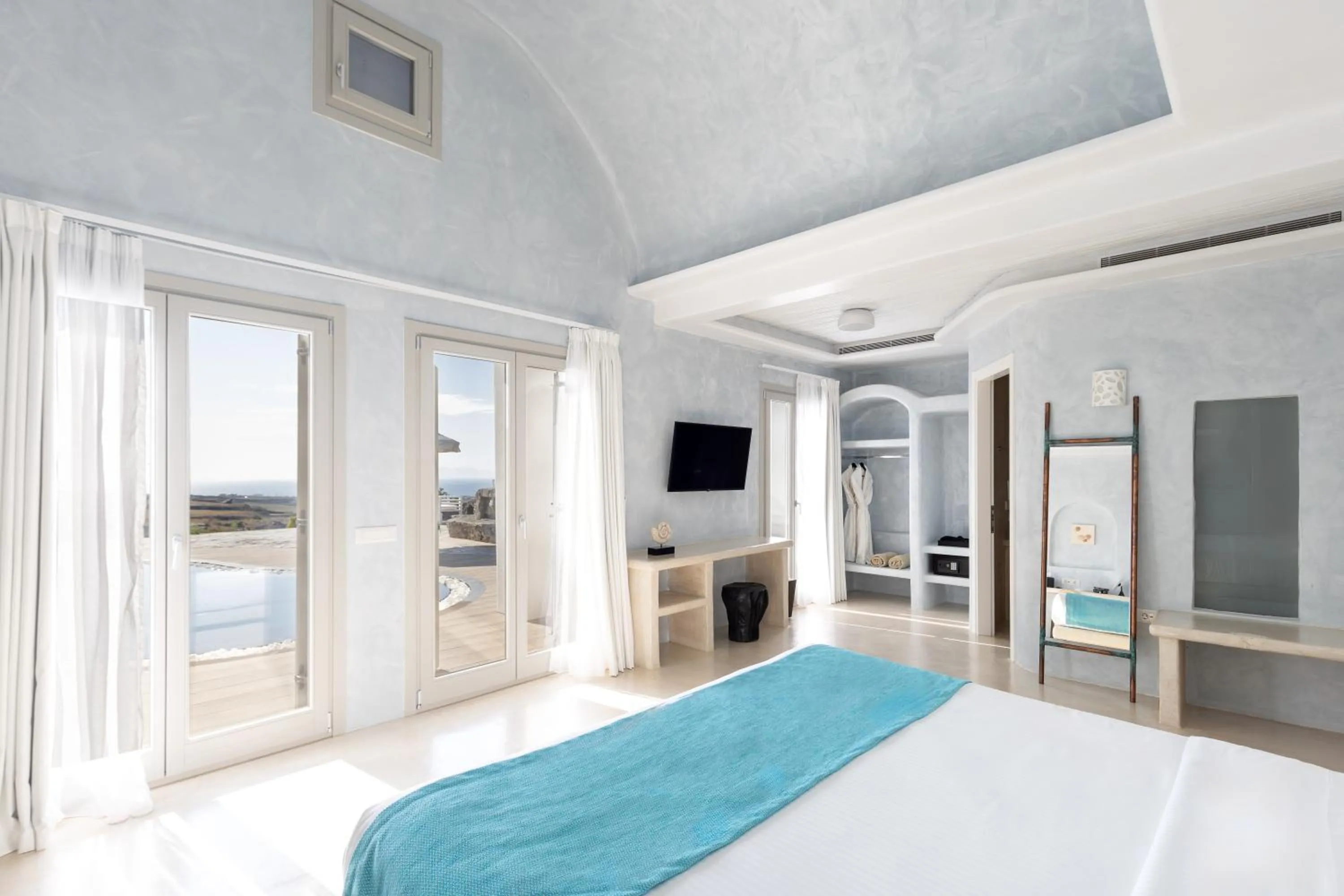 View (from property/room), Bed in Danae Suites Santorini