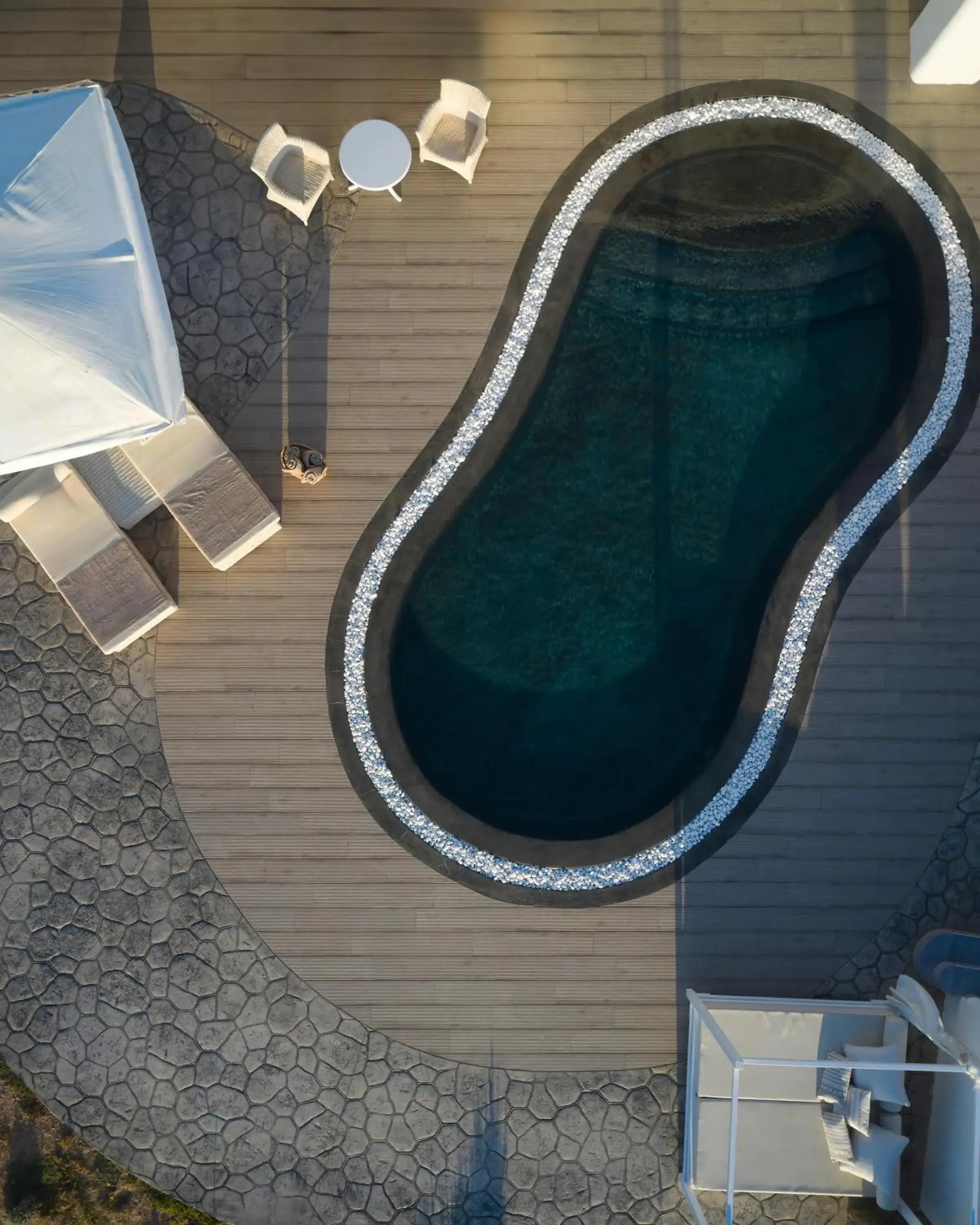Swimming pool in Danae Suites Santorini Swimming pool in Danae Suites Santorini