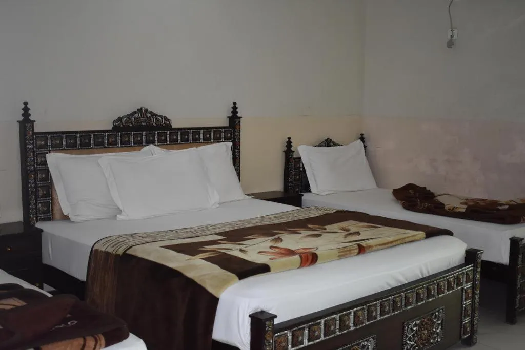 Bed in Hotel Khursheed Palace
