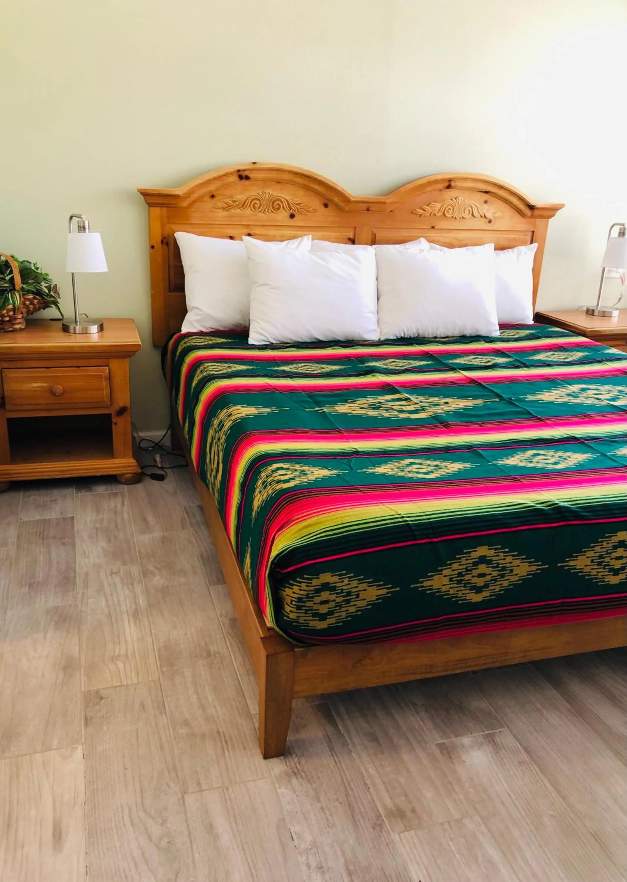 Bed in Sunset Inn and Suites