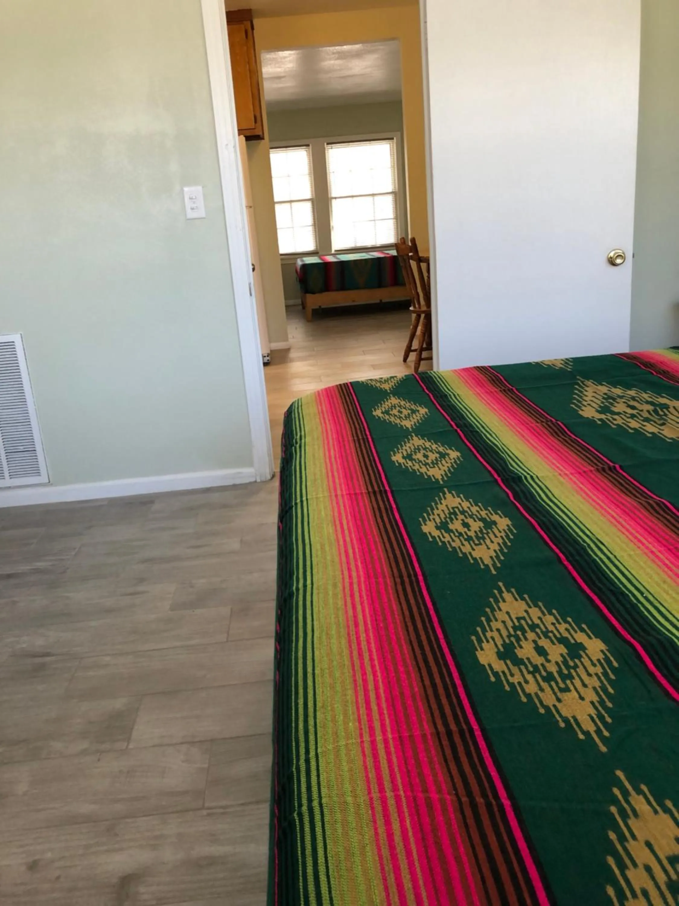 Bed in Sunset Inn and Suites