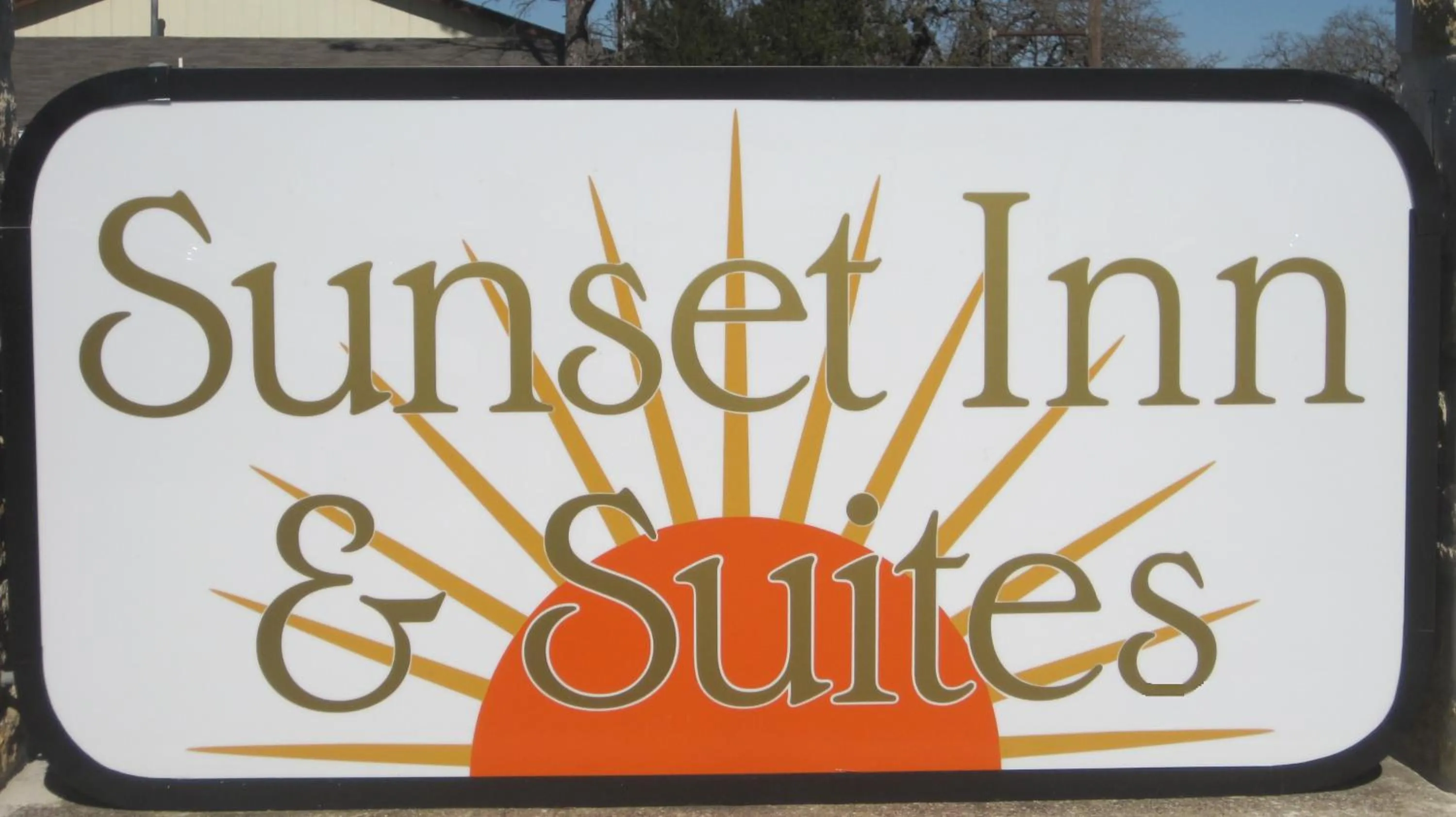 Property logo or sign in Sunset Inn and Suites