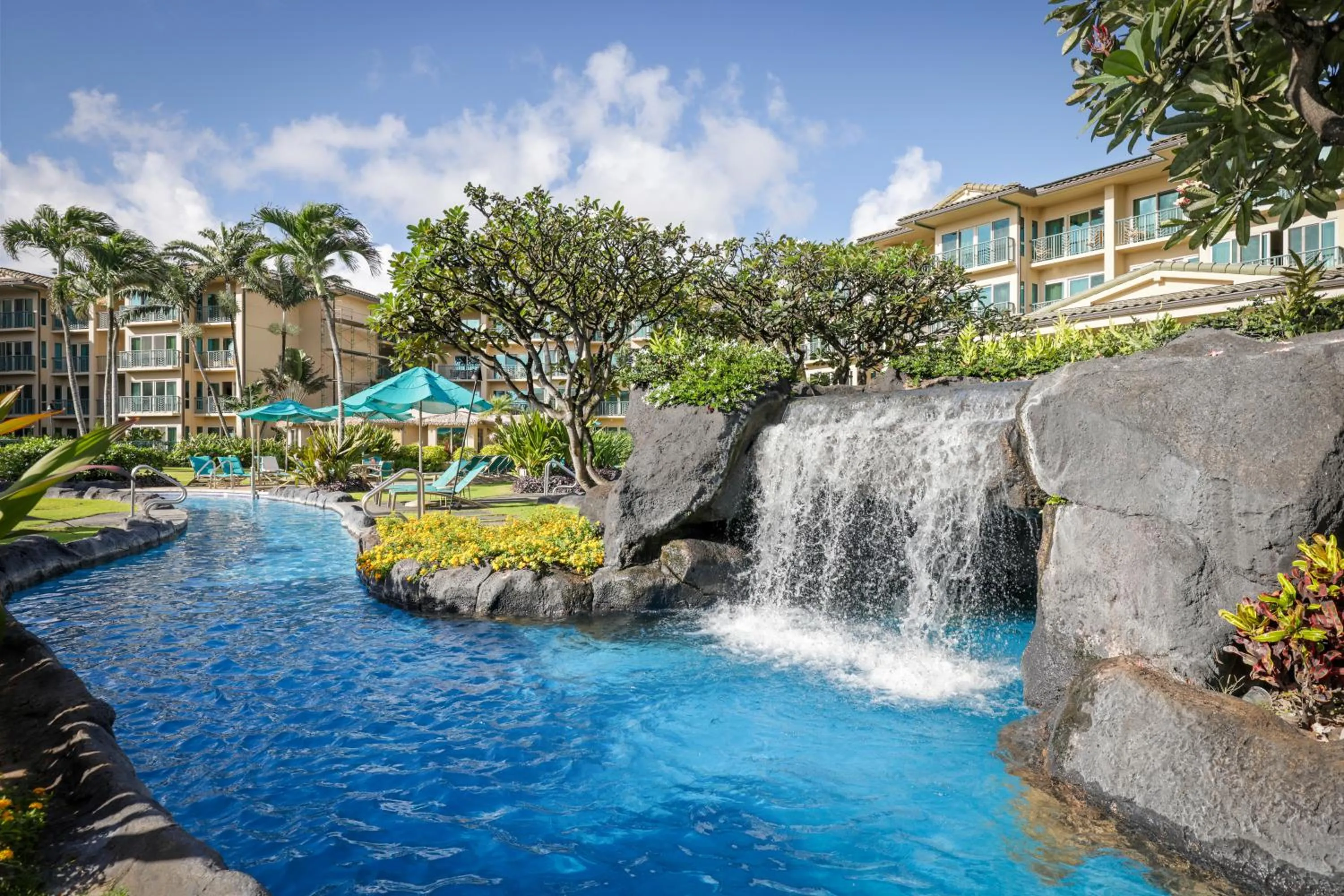 Swimming pool in Waipouli Beach Resort and Spa Kauai by OUTRIGGER