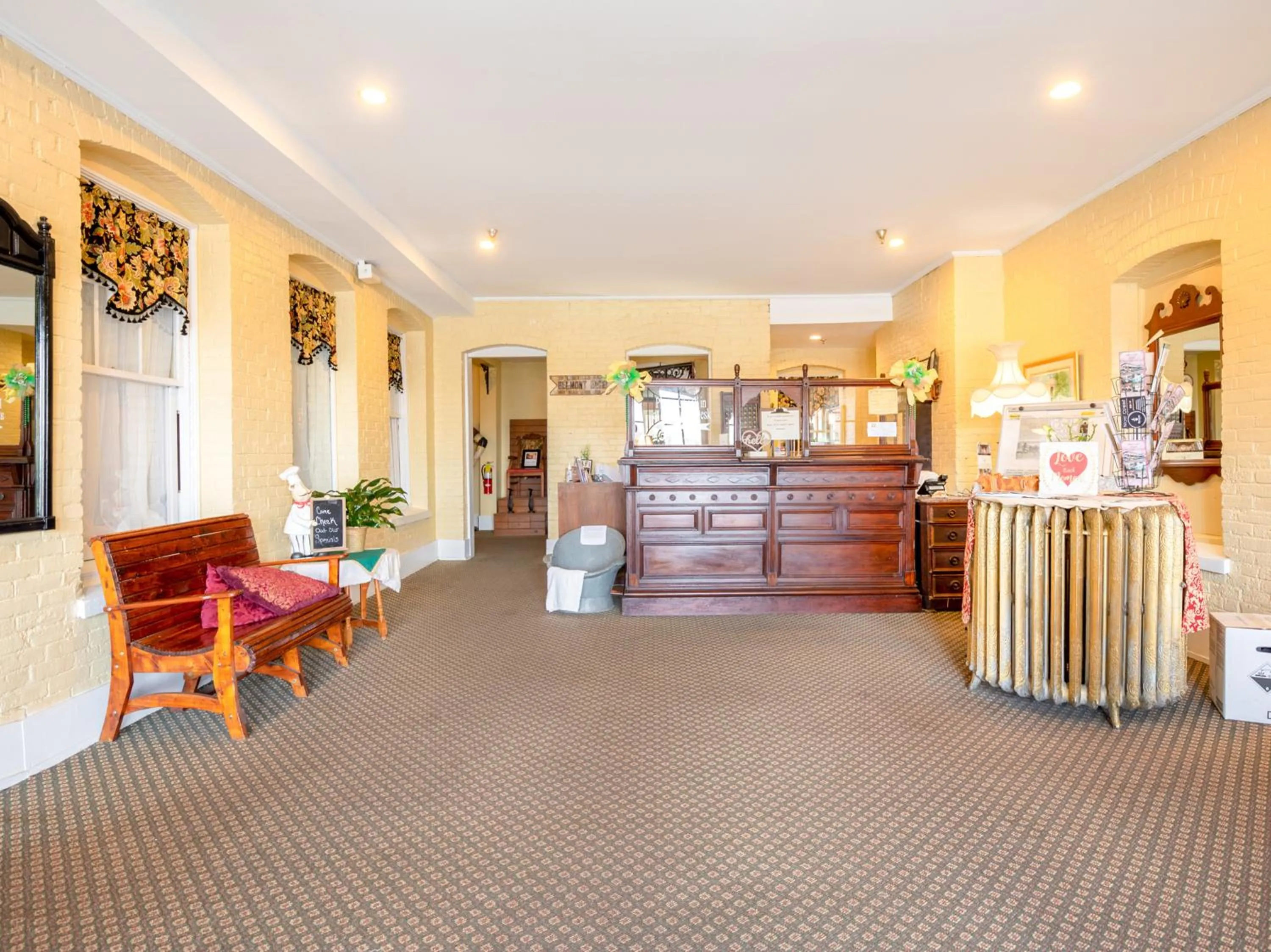 Lobby or reception in The Belmont Inn by OYO