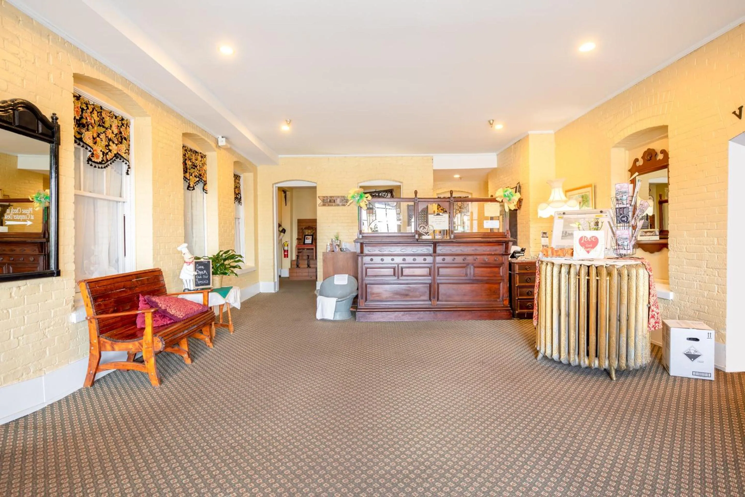 Lobby or reception in The Belmont Inn by OYO