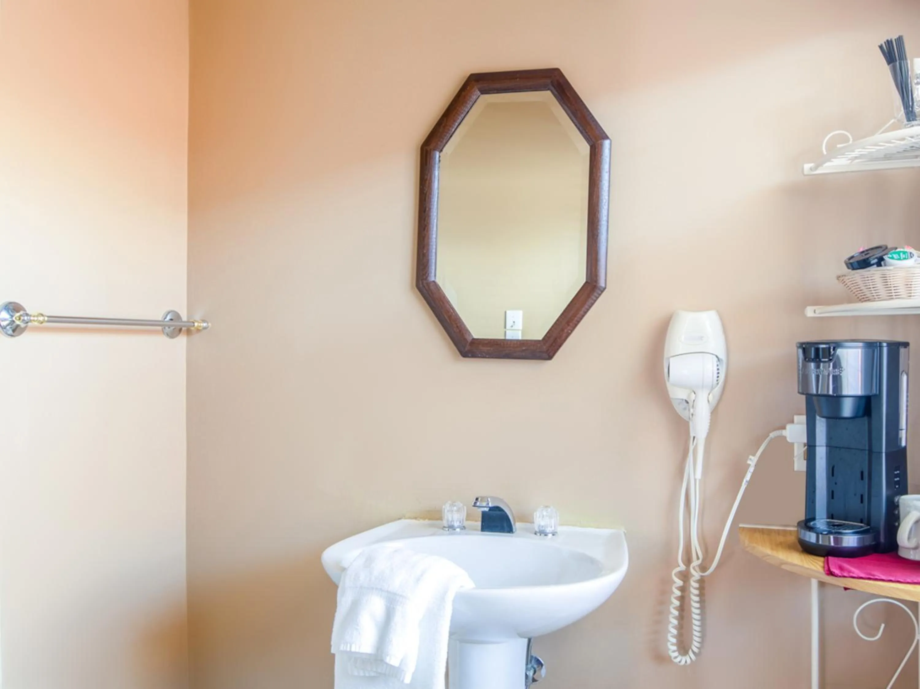 Bathroom in The Belmont Inn by OYO