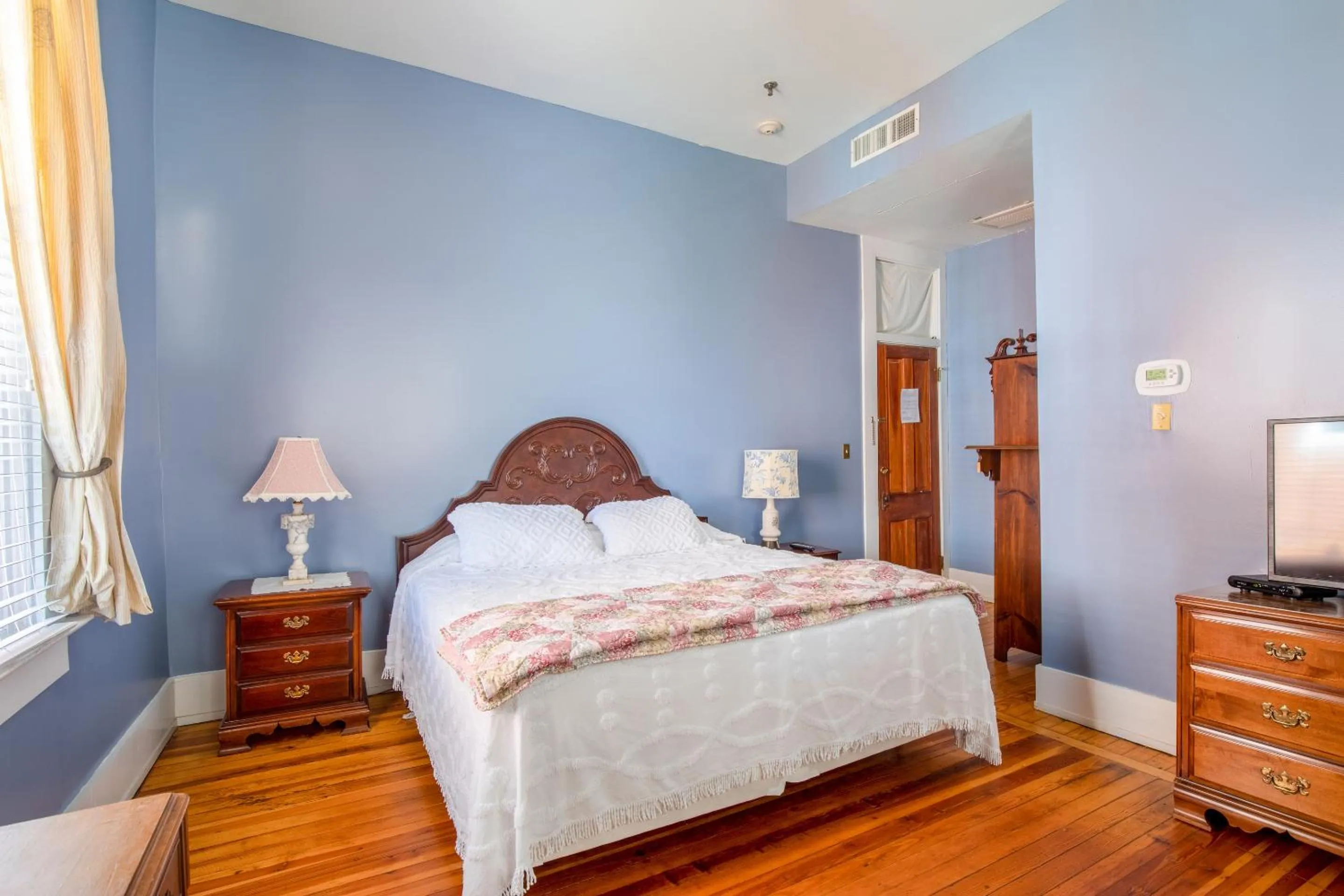 Bedroom, Bed in The Belmont Inn by OYO