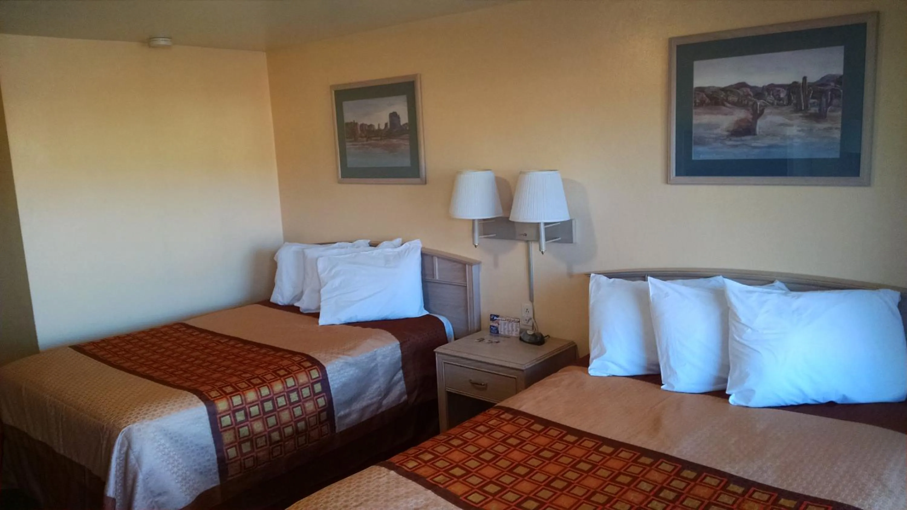 Bed in White Sands Motel