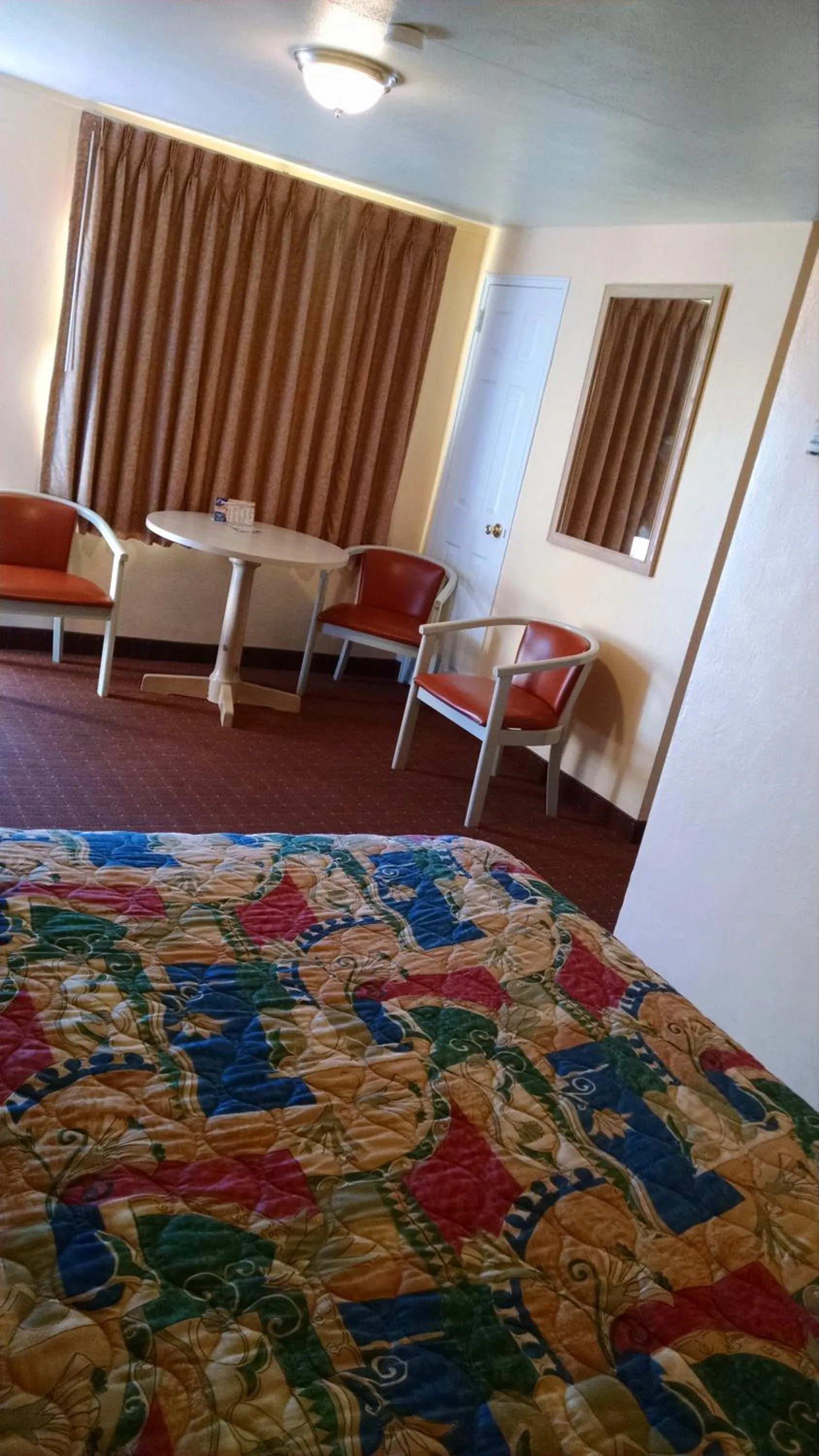 Bed in White Sands Motel