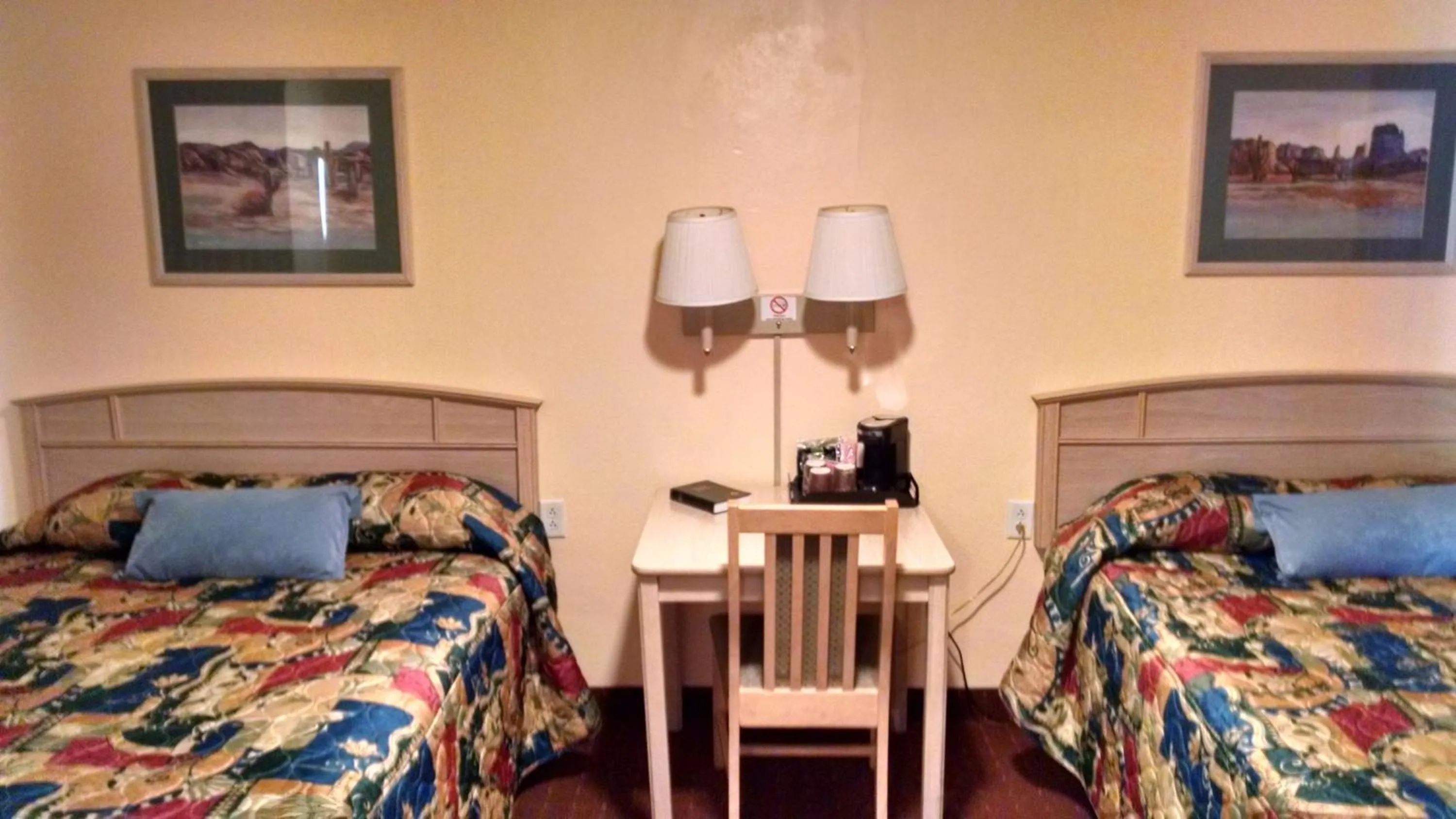 Bed in White Sands Motel