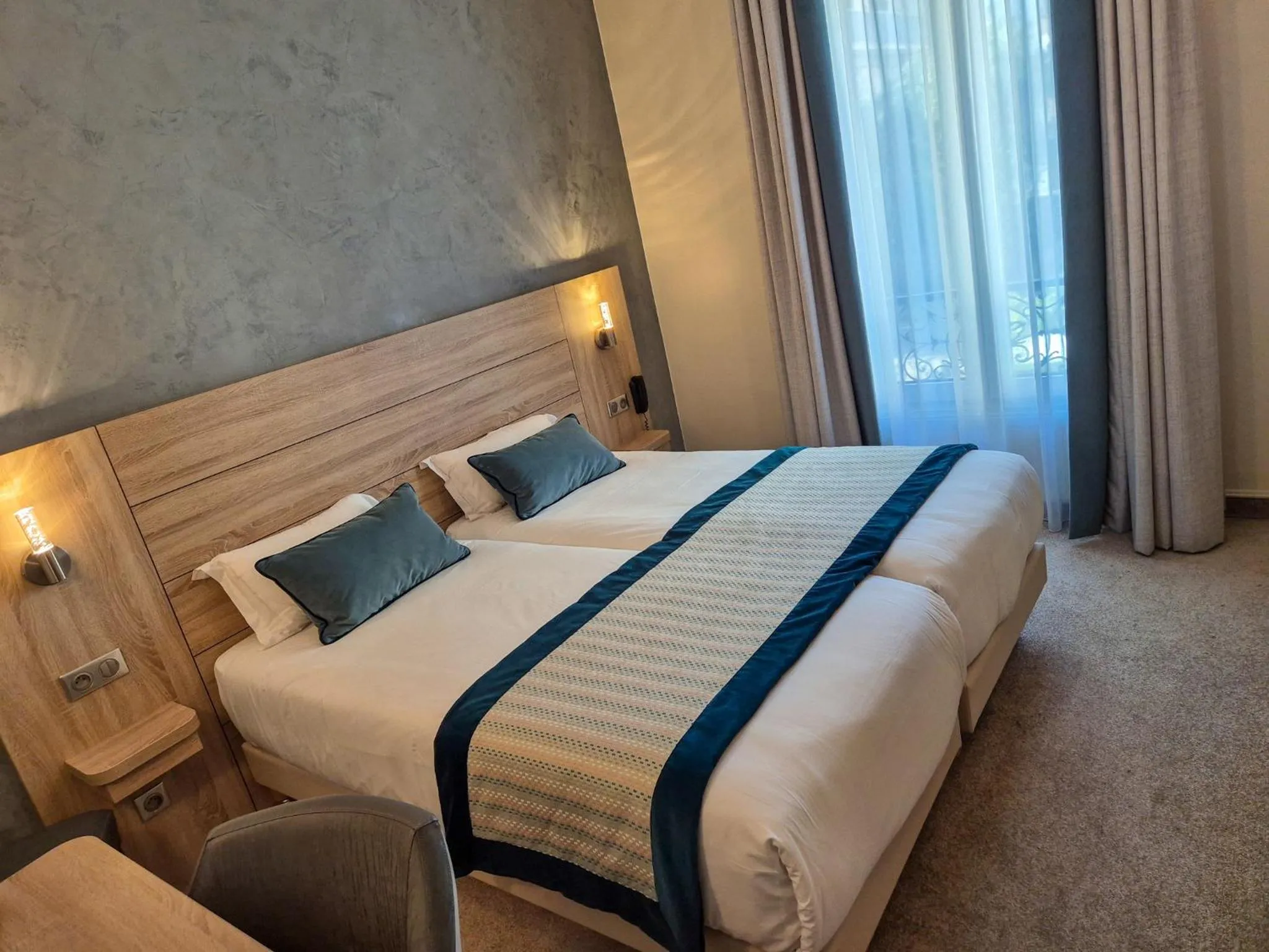 Bed in Hotel Champerret Elysees