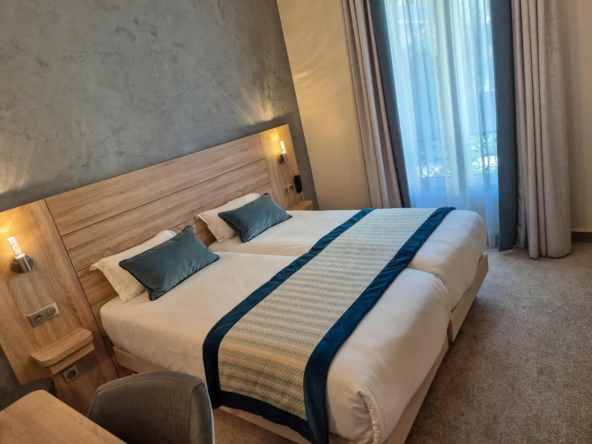 Bed in Hotel Champerret Elysees Bed in Hotel Champerret Elysees