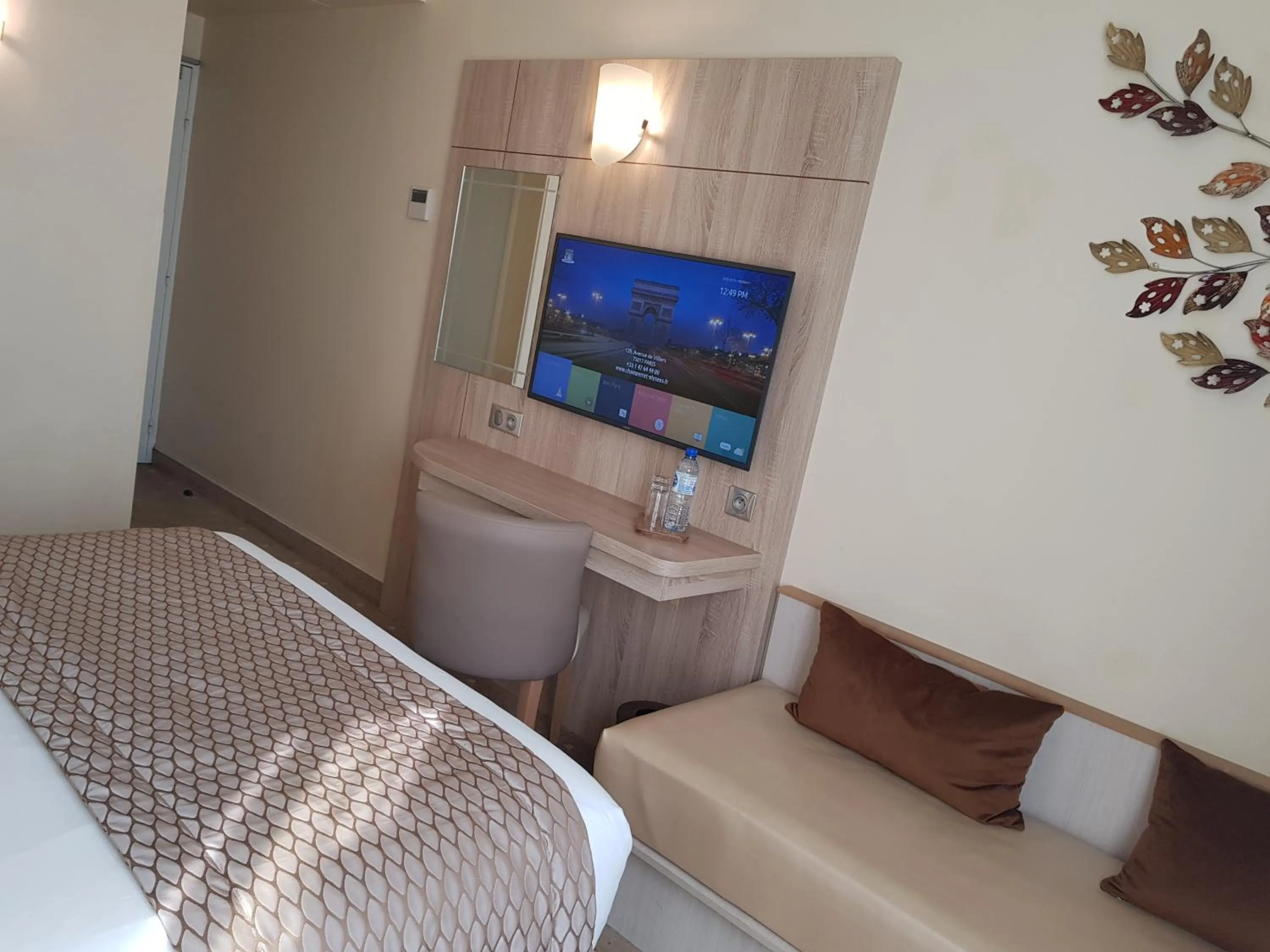 Bed in Hotel Champerret Elysees