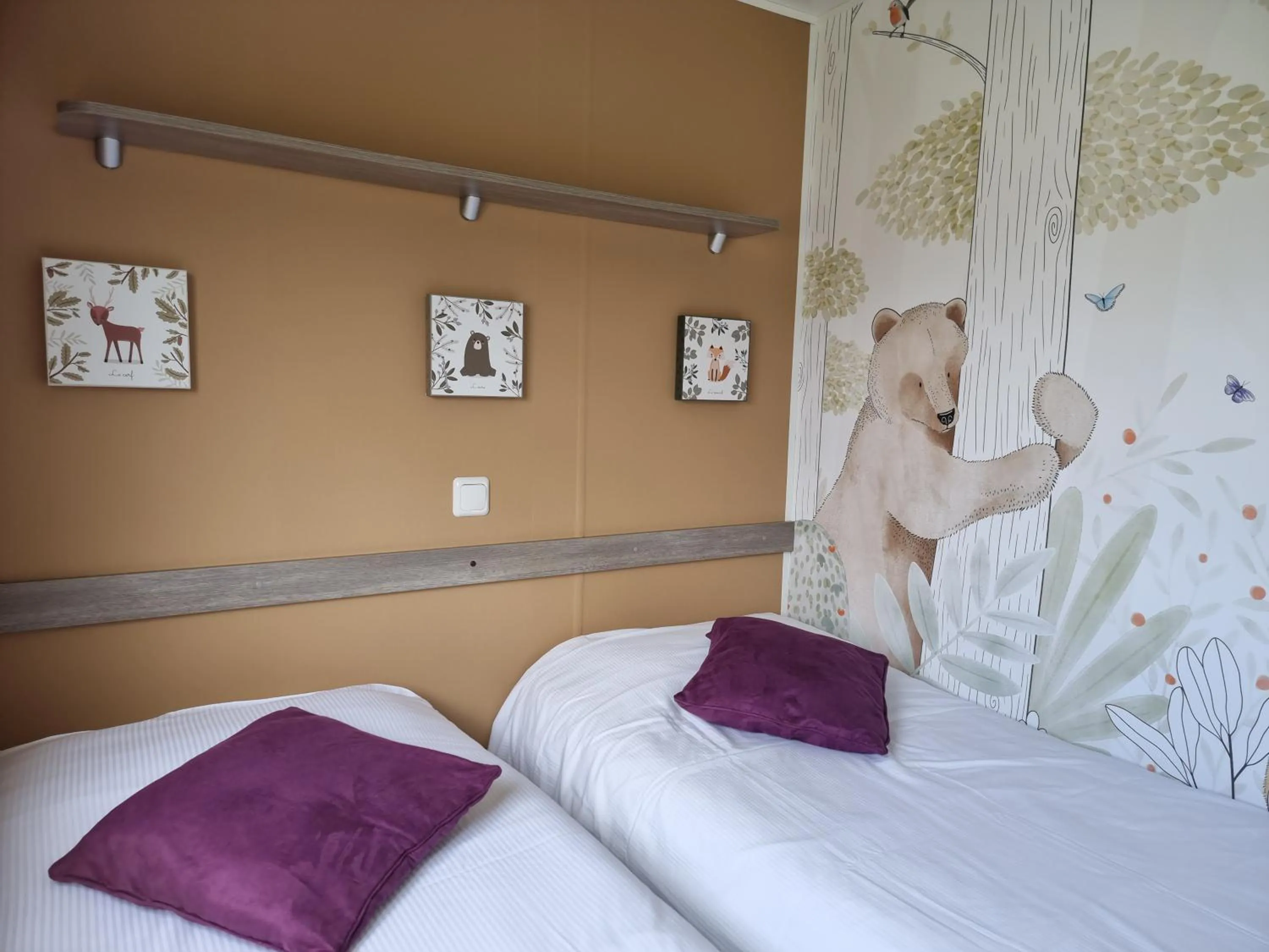 Bed in Hôtel du Moulin de la Brevette