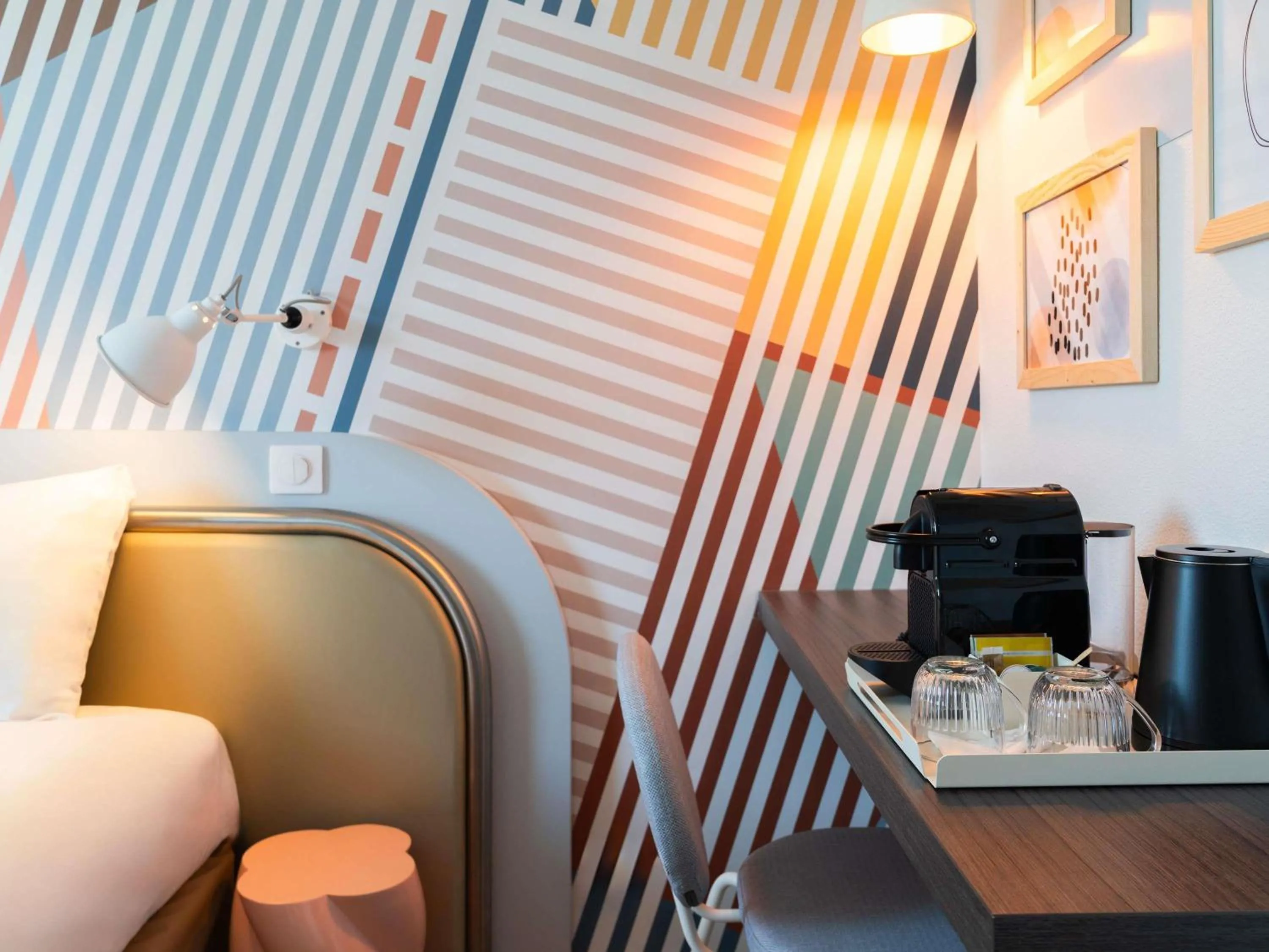 Bedroom in ibis Styles Paris Porte d'Orléans