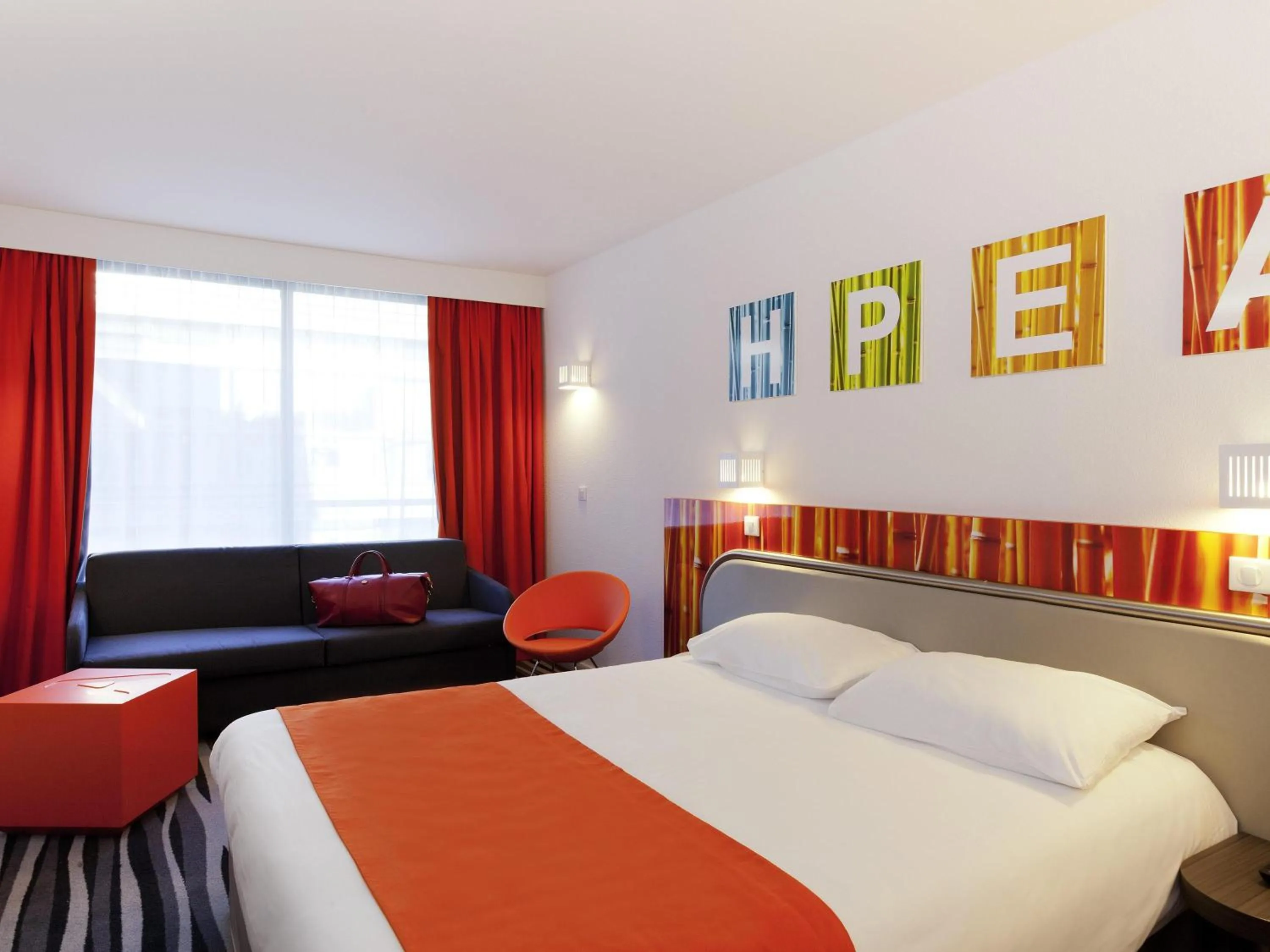 Bedroom, Bed in ibis Styles Paris Porte d'Orléans