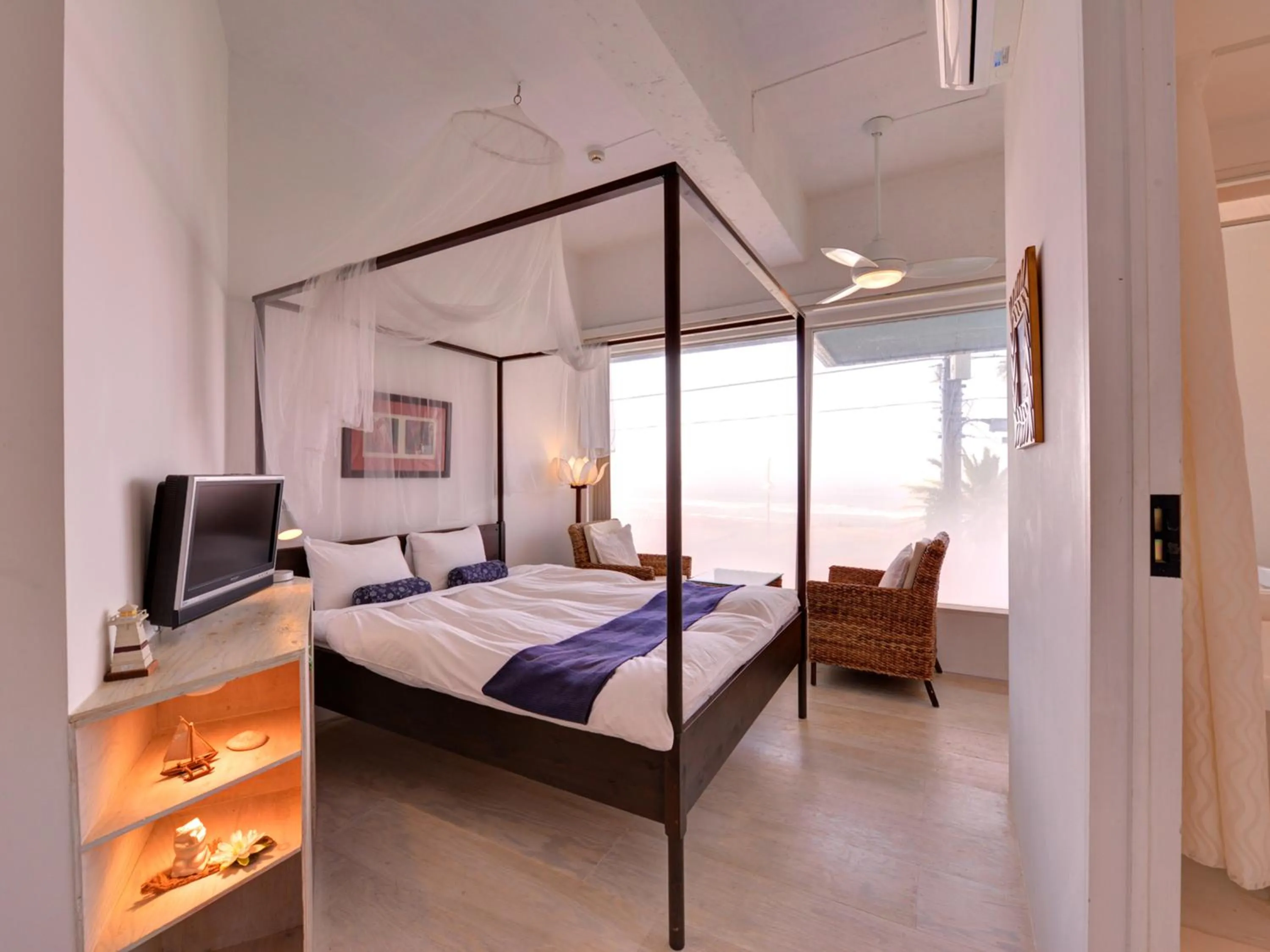 Photo of the whole room, Bed in Sound Swell Resort