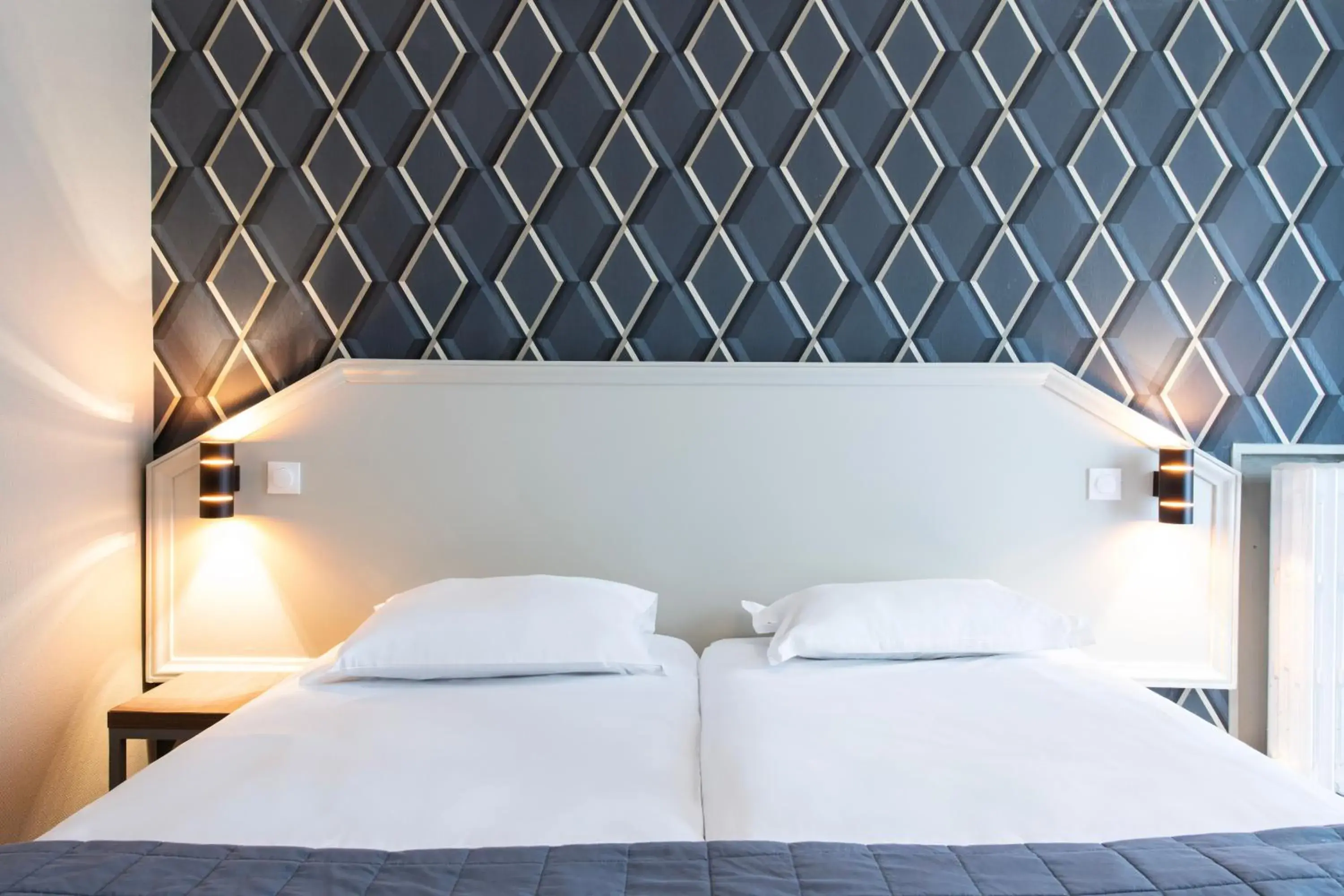 Bedroom, Bed in Hôtel Ambassadeur Bedroom, Bed in Hôtel Ambassadeur