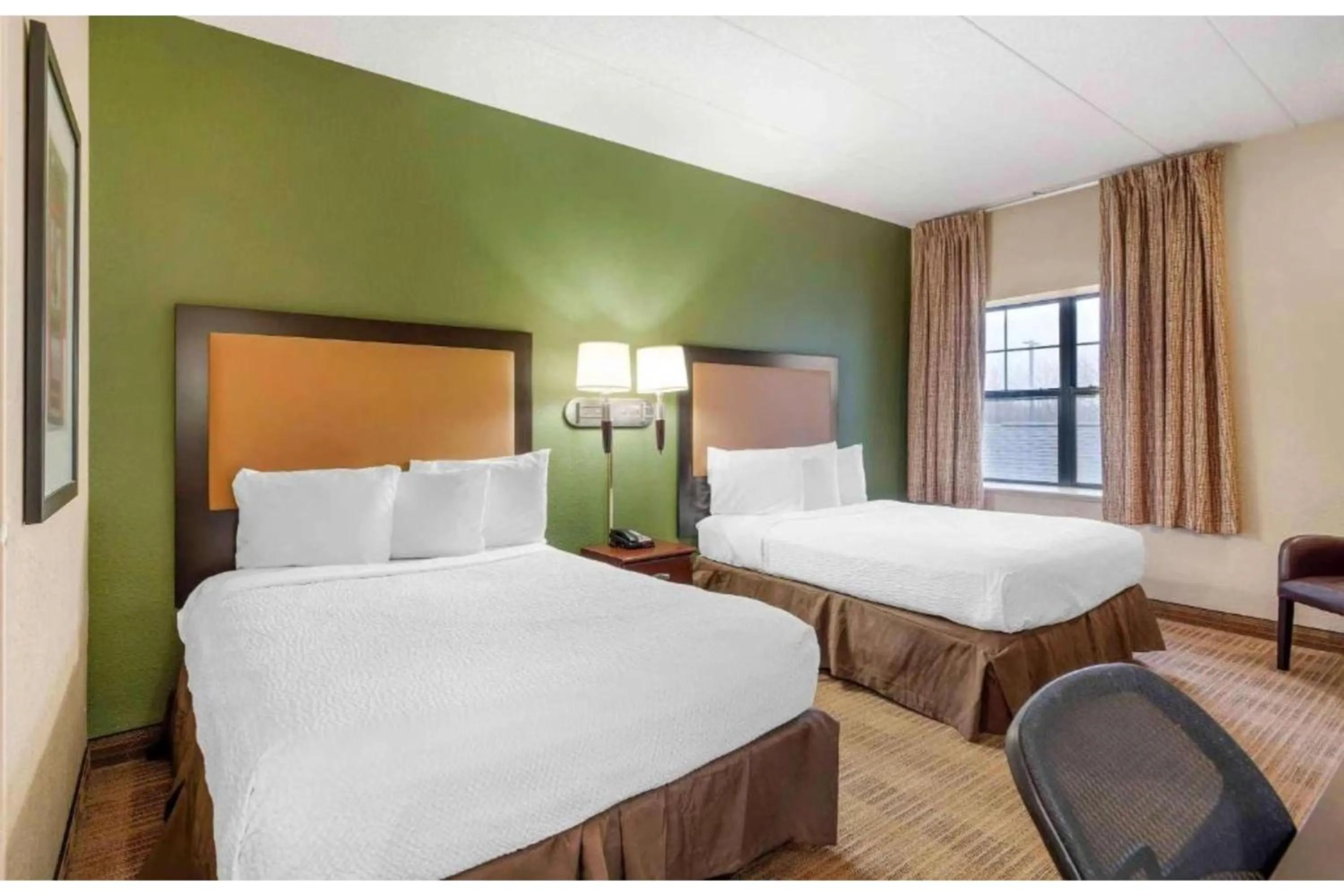 Bedroom, Bed in Studio 6 Corporate Extended Stay Chicago Lisle IL