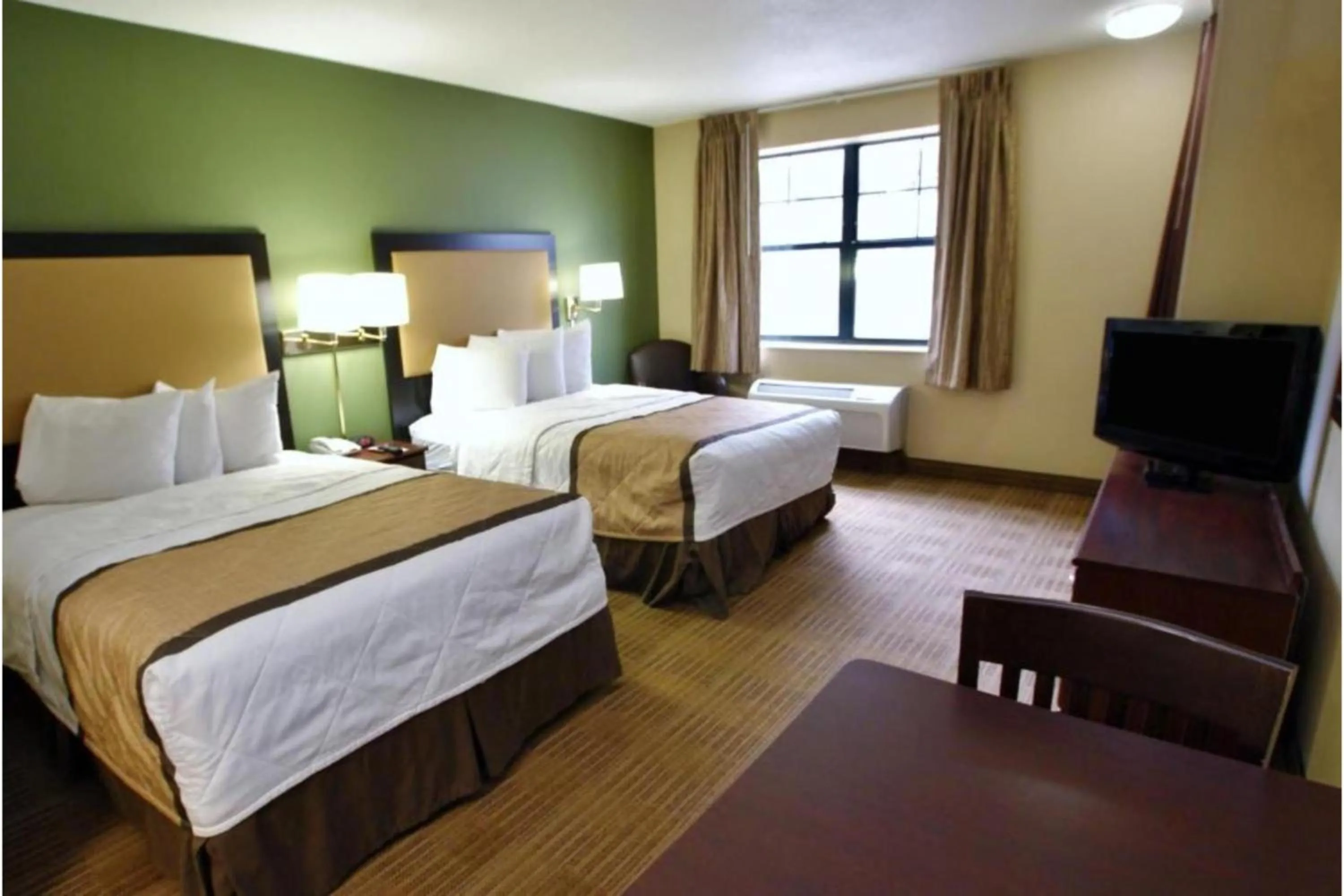 Bedroom, Bed in Studio 6 Corporate Extended Stay Chicago Lisle IL