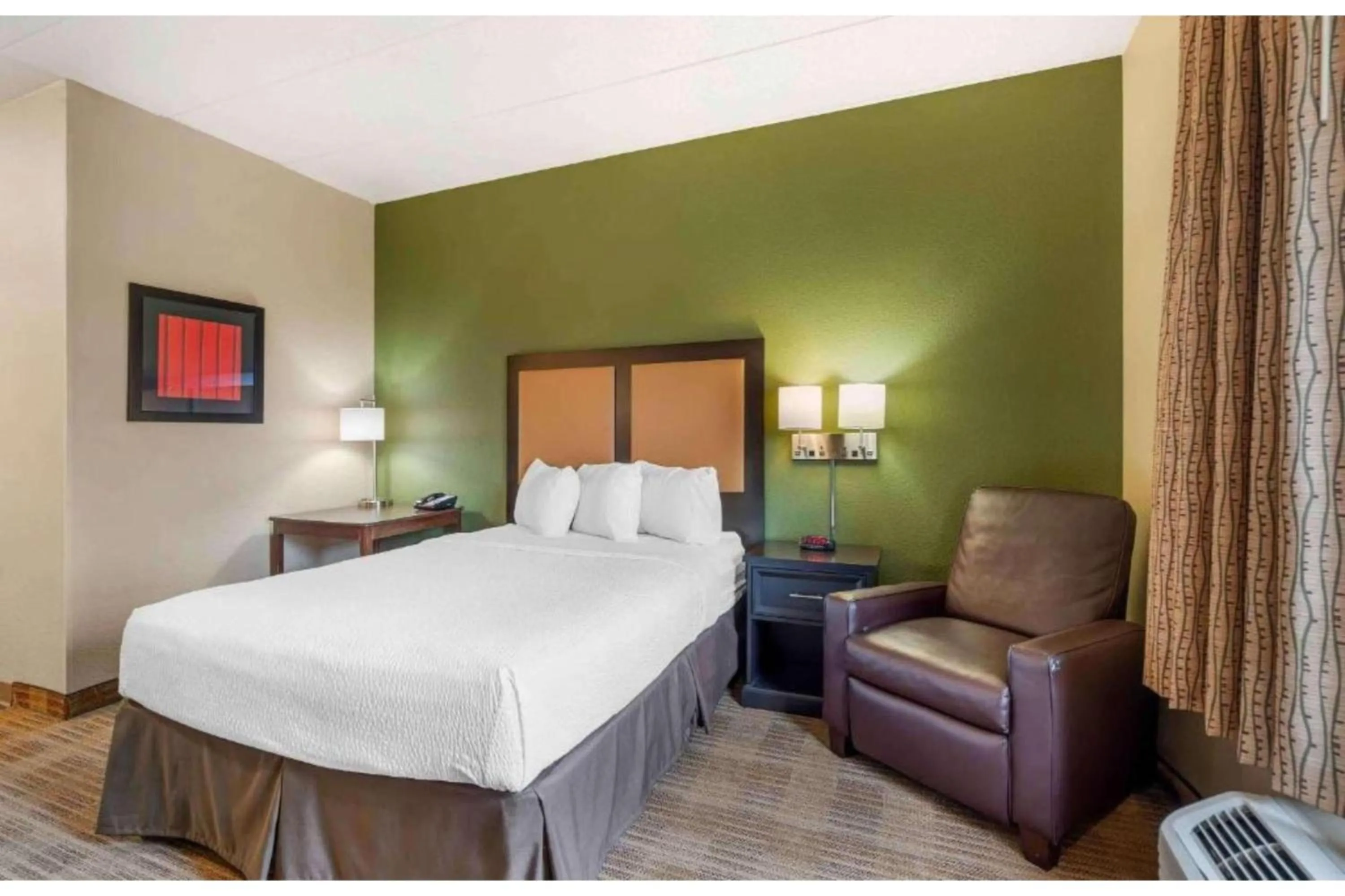 Bedroom, Bed in Studio 6 Corporate Extended Stay Chicago Lisle IL
