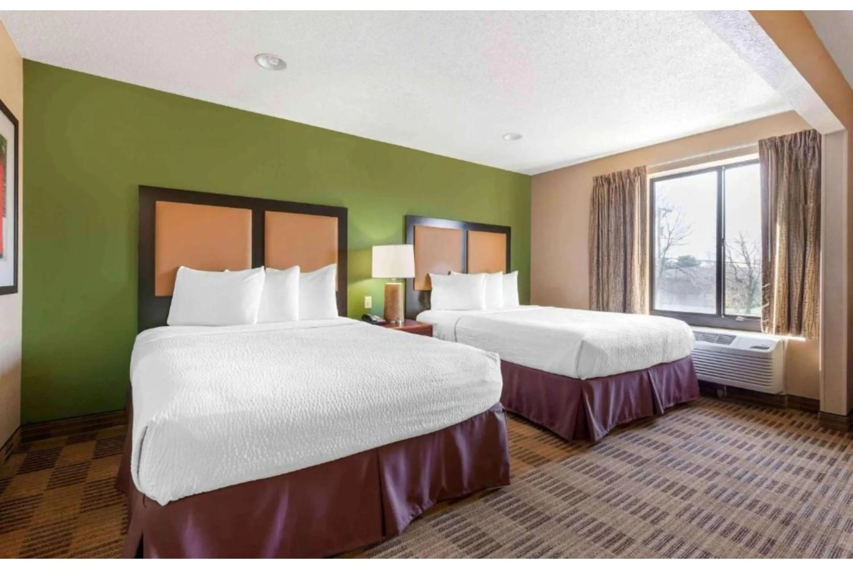 Bedroom, Bed in Studio 6 Corporate Extended Stay Chicago Lisle IL