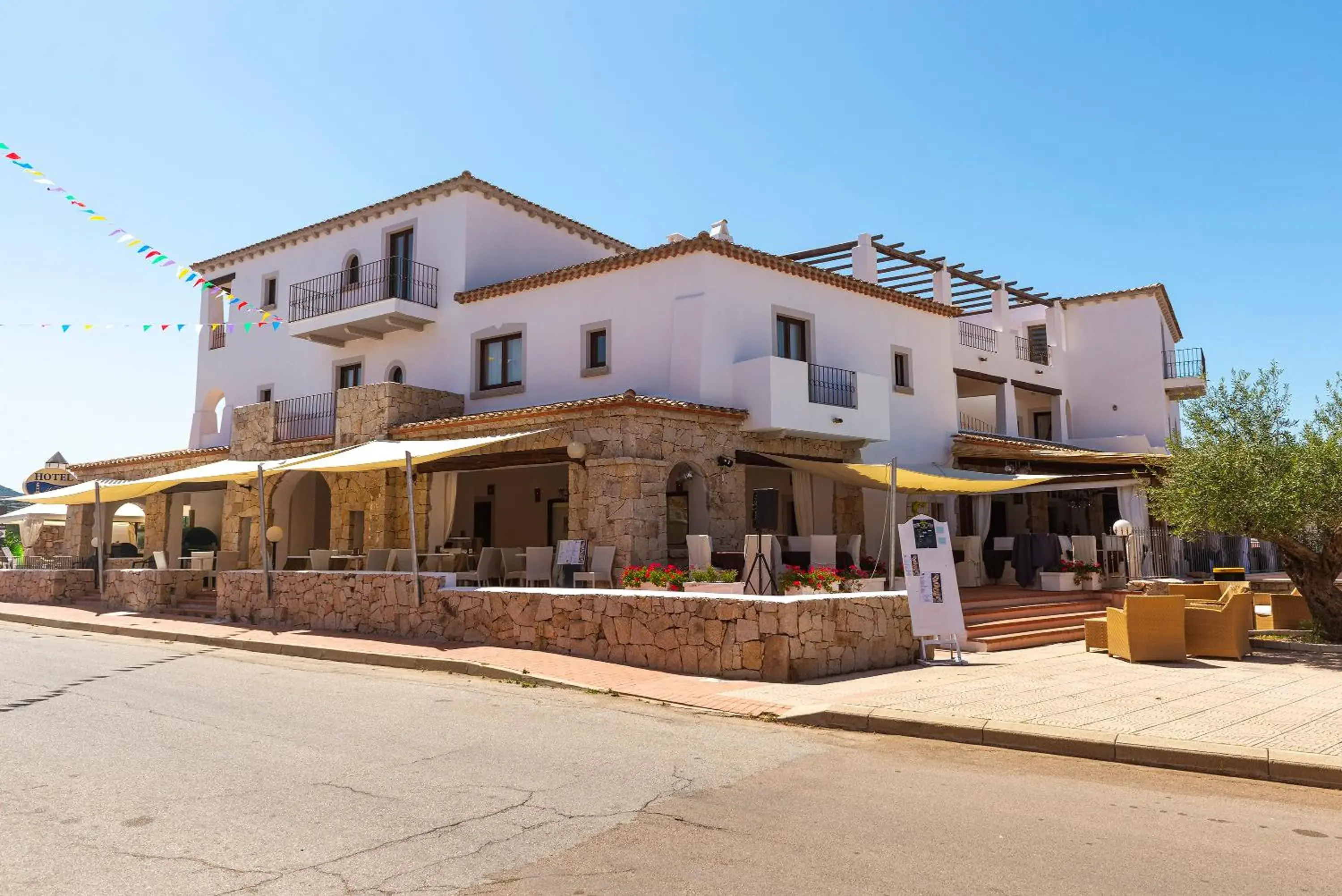 Property building in Hotel il Faro di Molara Property building in Hotel il Faro di Molara