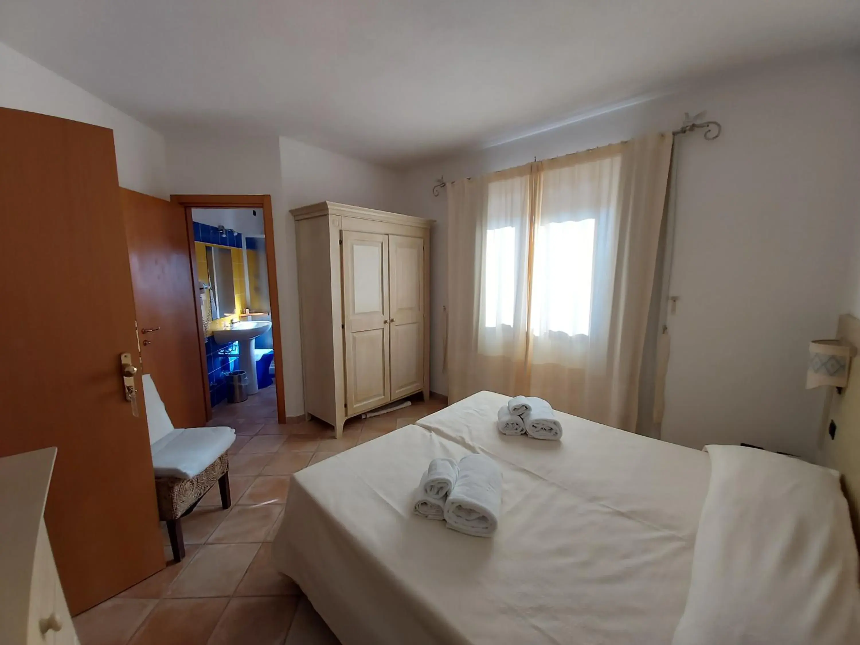 Bedroom in Hotel il Faro di Molara Bedroom in Hotel il Faro di Molara