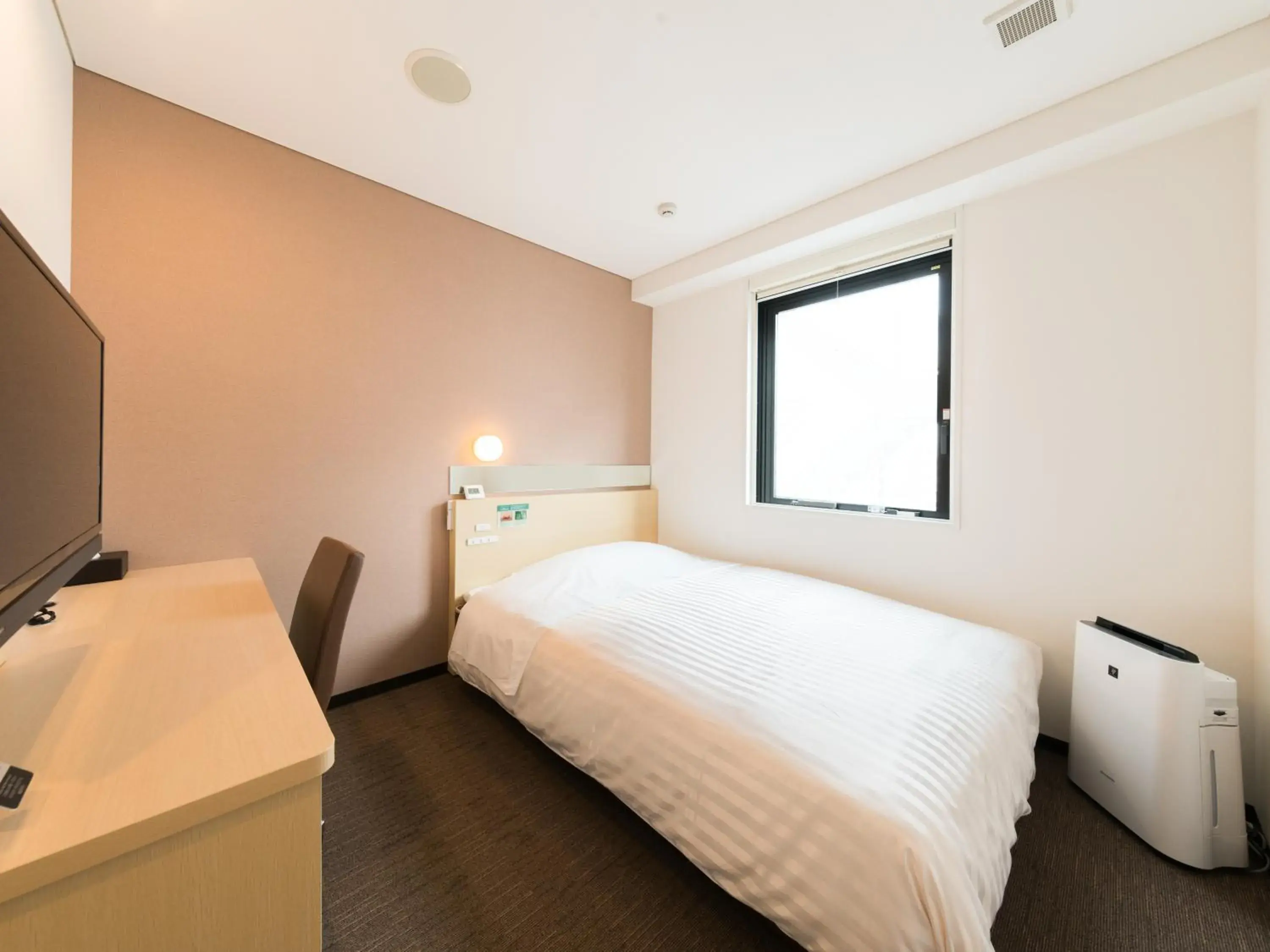 Bed in Super Hotel Tokyo Kinshicho Ekimae Bed in Super Hotel Tokyo Kinshicho Ekimae