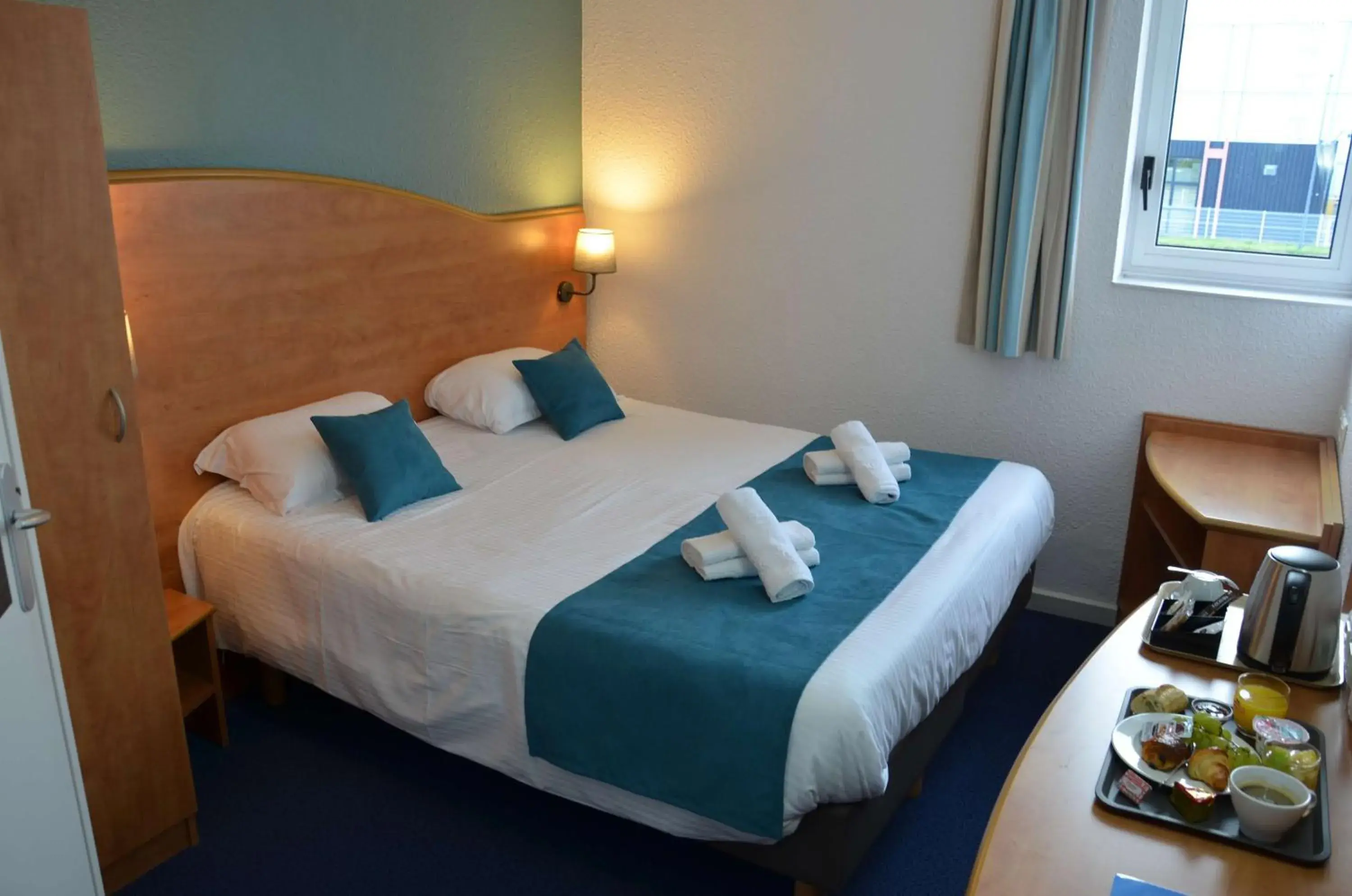 Bedroom, Bed in BRIT HOTEL Caen Hérouville Bedroom, Bed in BRIT HOTEL Caen Hérouville