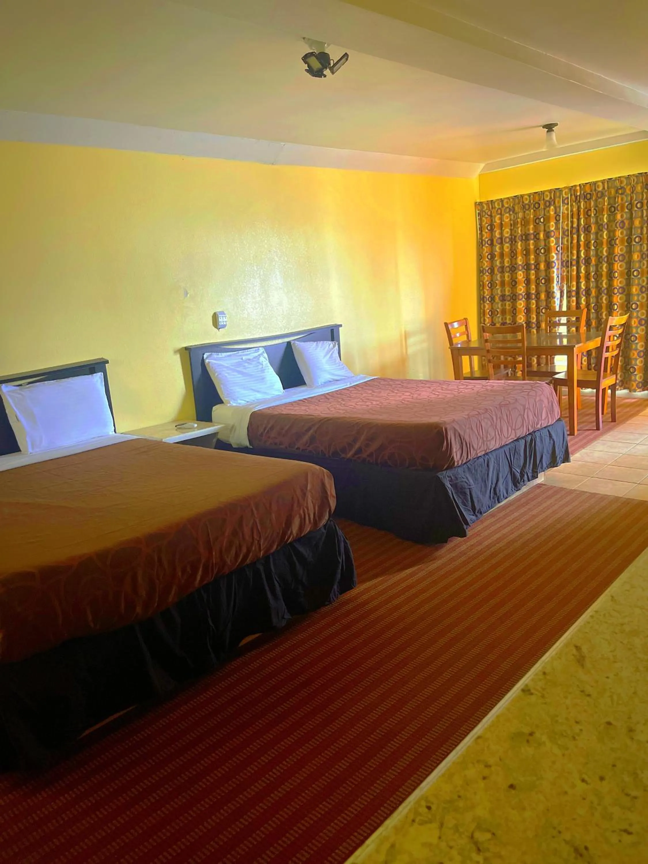 Bed in Sea Shell Inn on the Beach