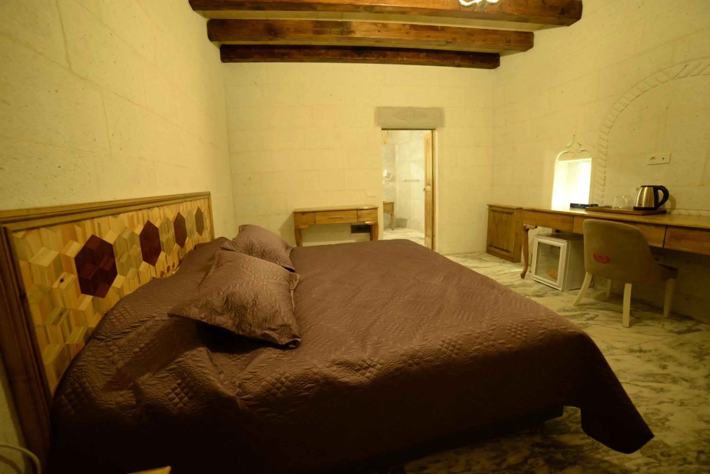 Bed in Crassus Cave Hotel