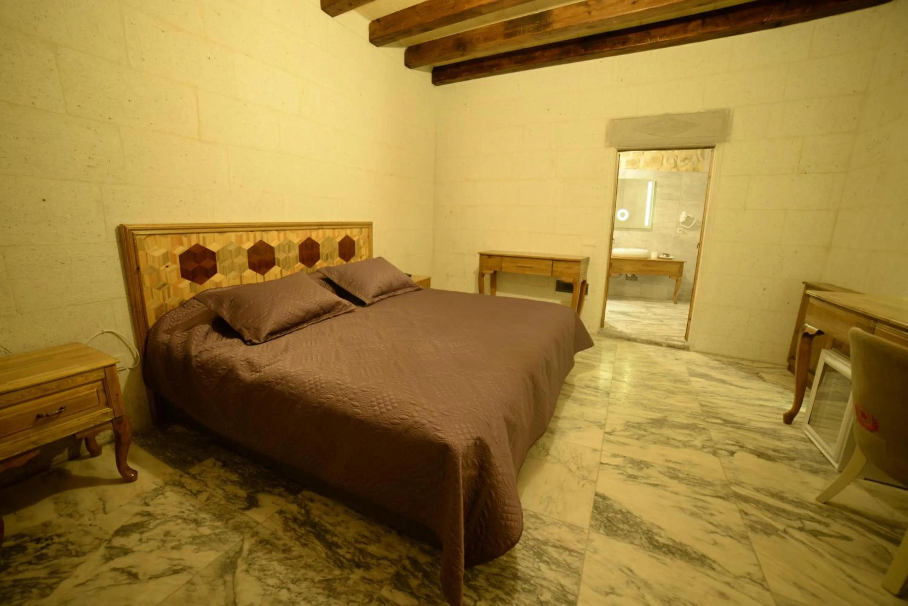 Bed in Crassus Cave Hotel