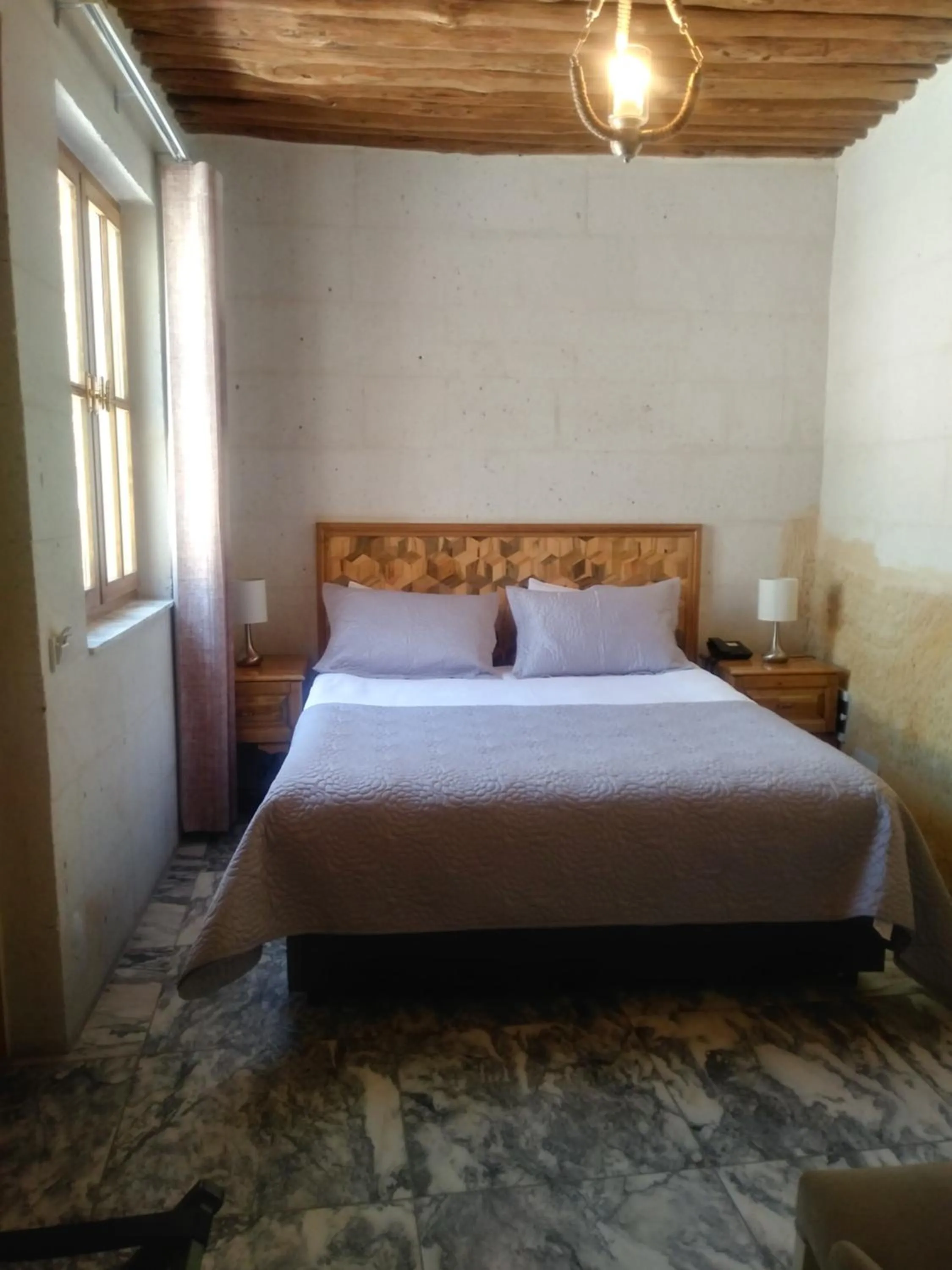 Bed in Crassus Cave Hotel