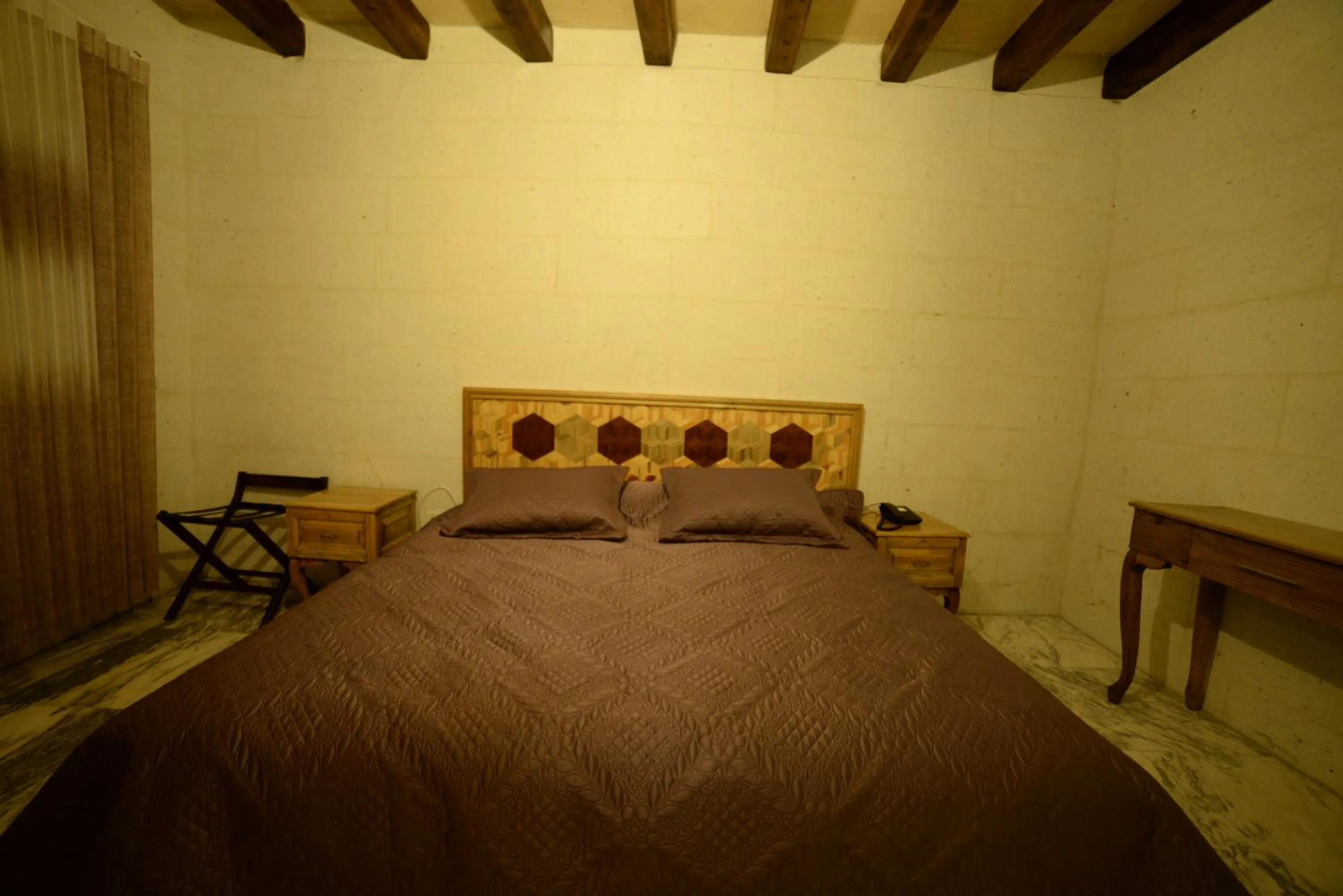 Bed in Crassus Cave Hotel