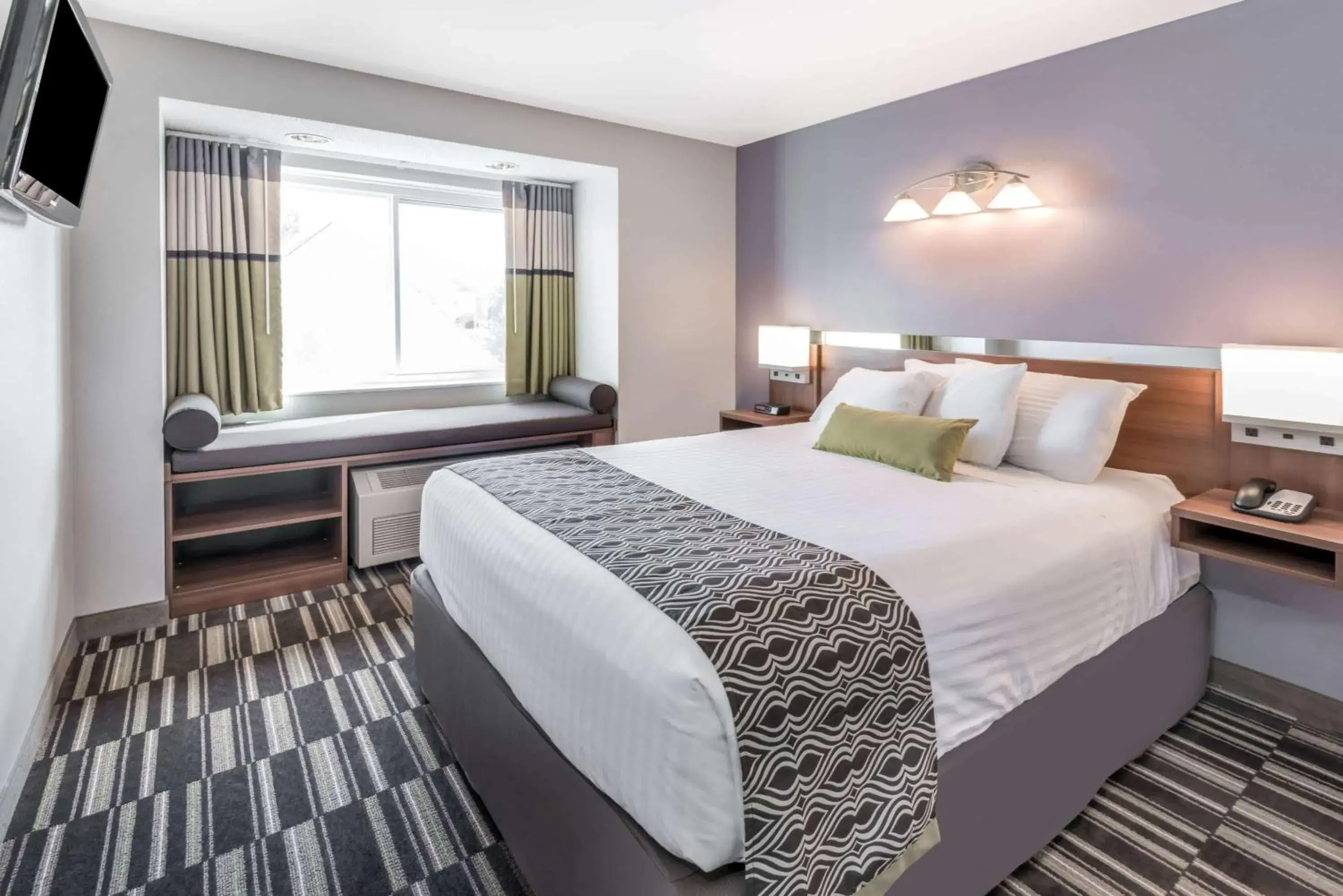 Photo of the whole room, Bed in Microtel By Wyndham Victor Photo of the whole room, Bed in Microtel By Wyndham Victor