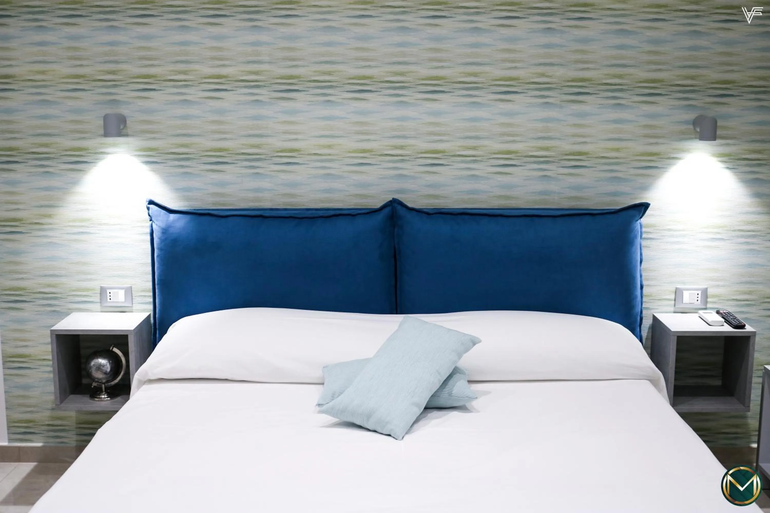 Bed in MARGHERITA BOUTIQUE ROOMS