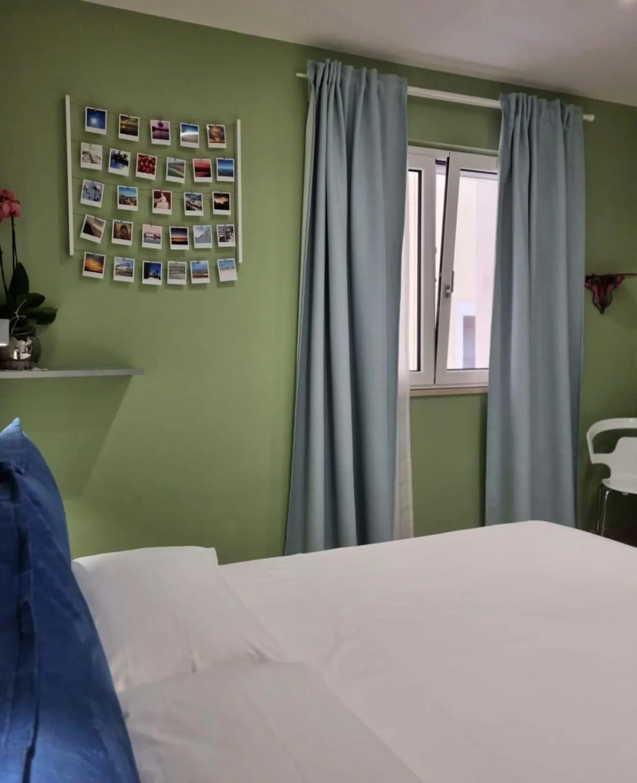 Bed in MARGHERITA BOUTIQUE ROOMS