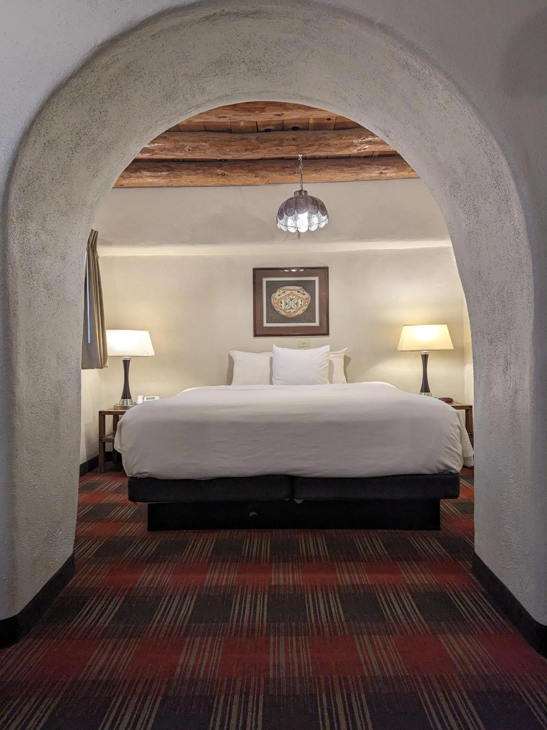 Bed in Sagebrush Inn & Suites