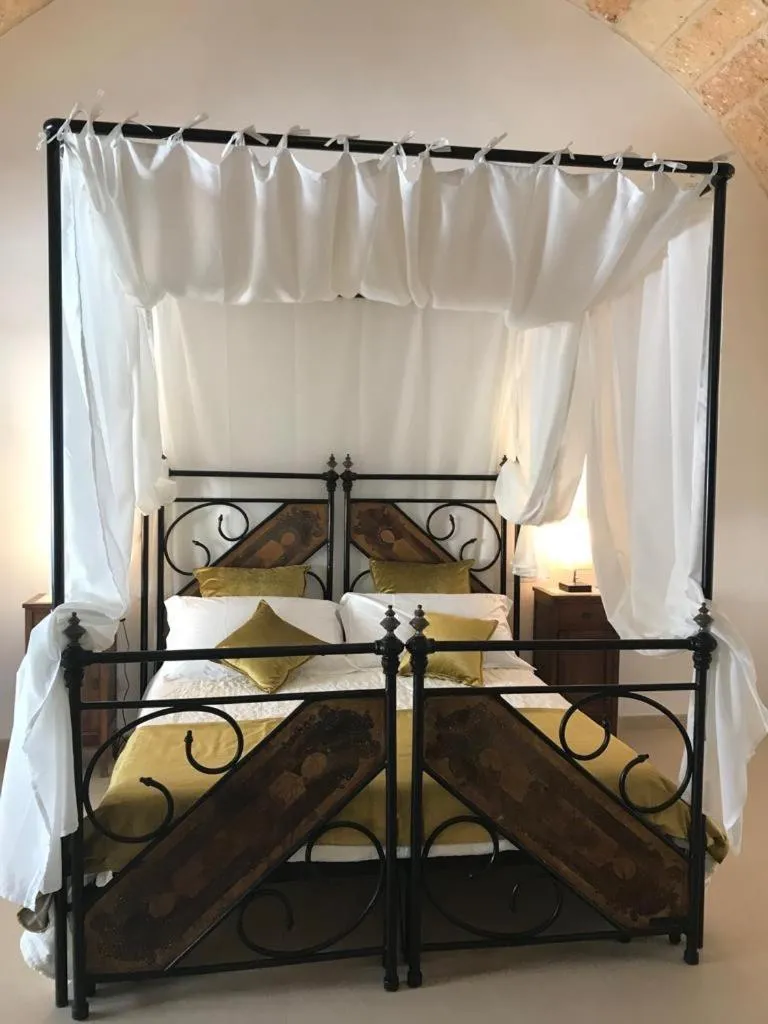 Bed in Donna Michelina dimora B&B