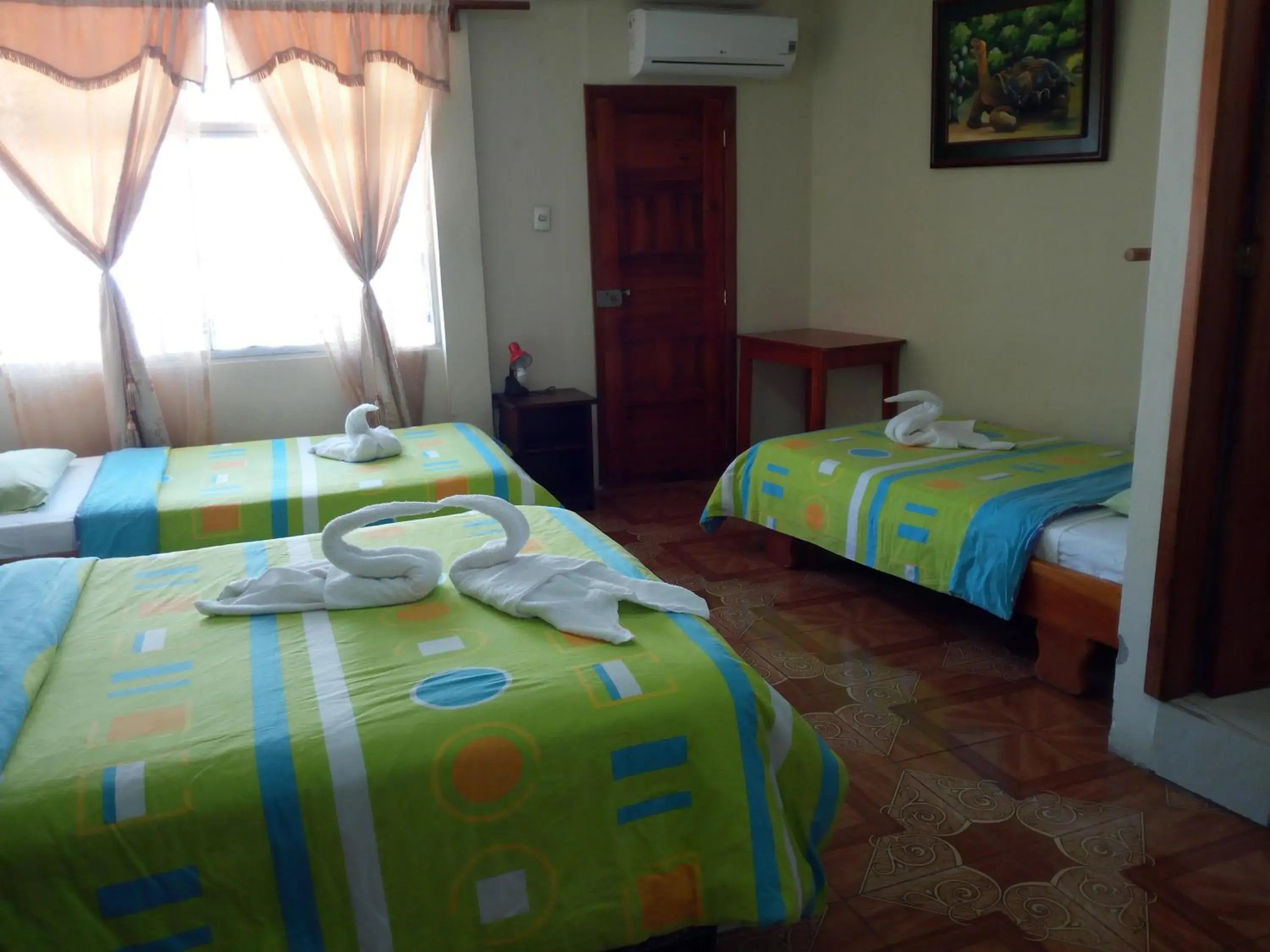Classic Quadruple Room in Hostal Miconia Classic Quadruple Room in Hostal Miconia