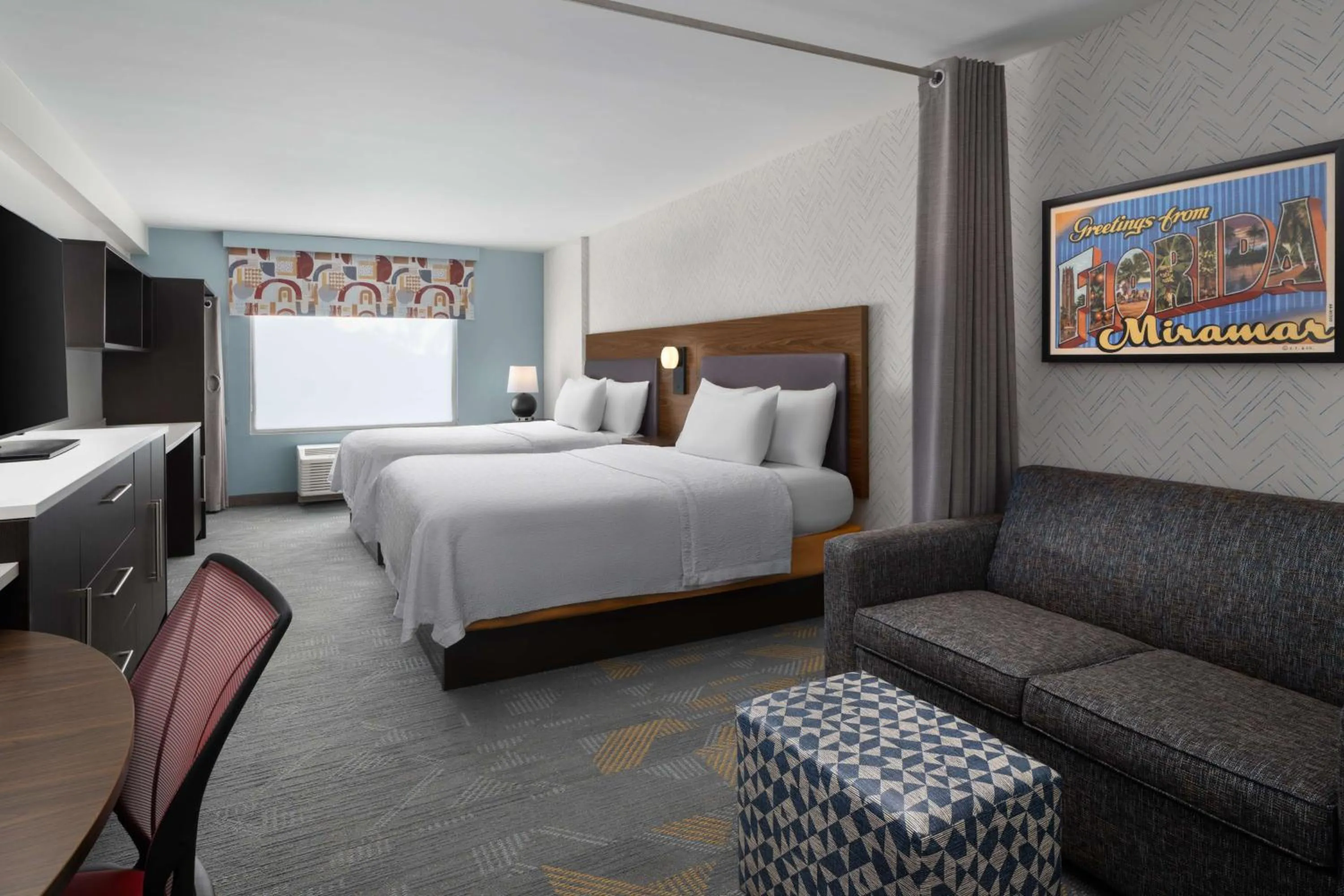 Living room, Bed in Home2 Suites by Hilton Miramar Ft. Lauderdale