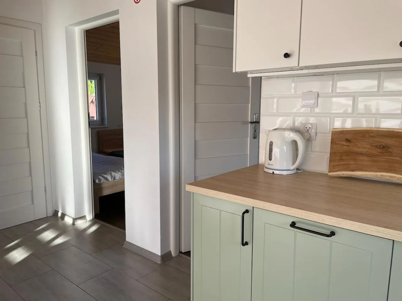 Kitchen or kitchenette in Domki u Grażyny Mikołajki