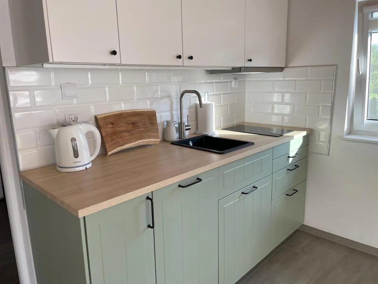 Kitchen or kitchenette in Domki u Grażyny Mikołajki