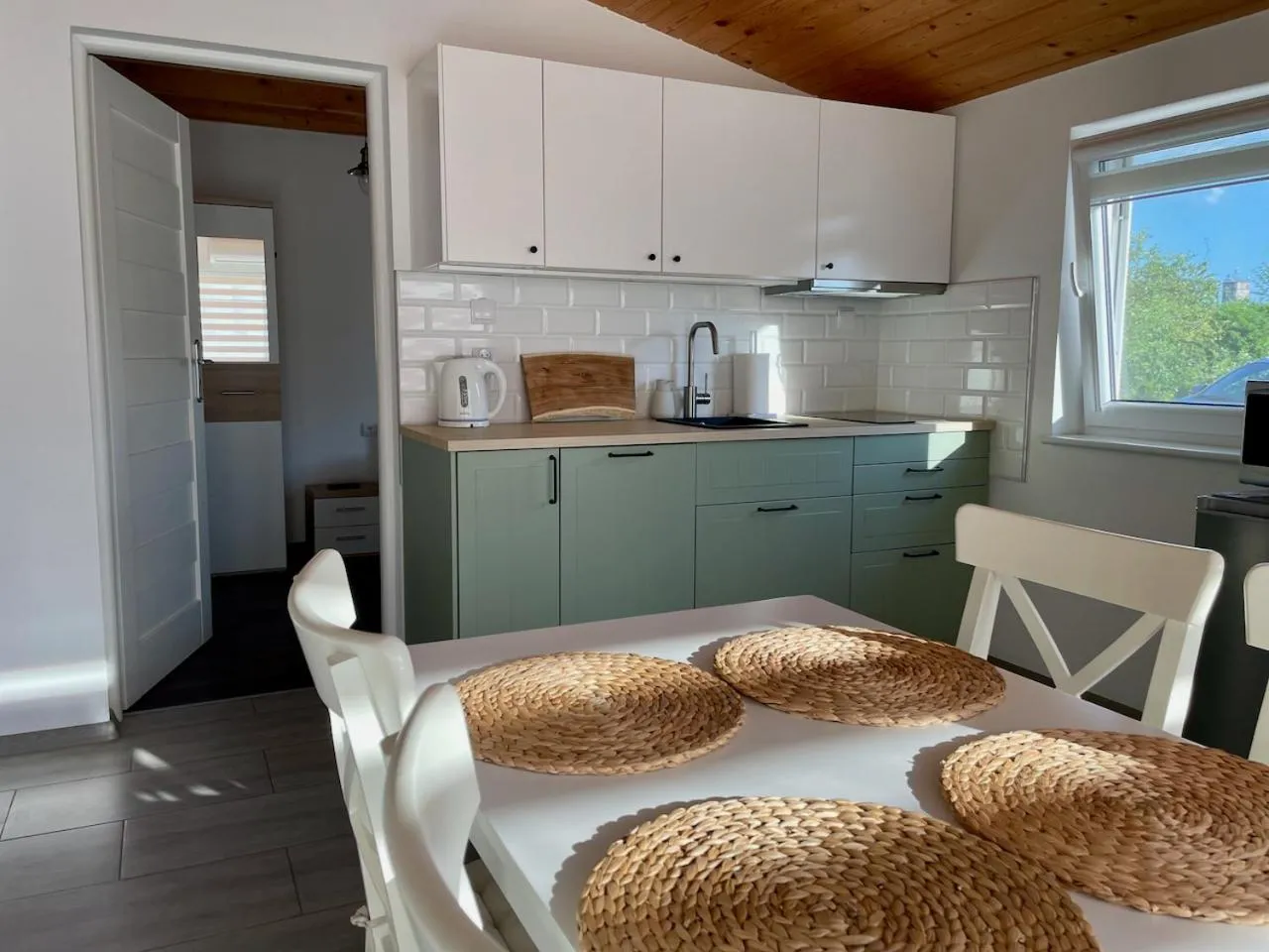 Kitchen or kitchenette in Domki u Grażyny Mikołajki