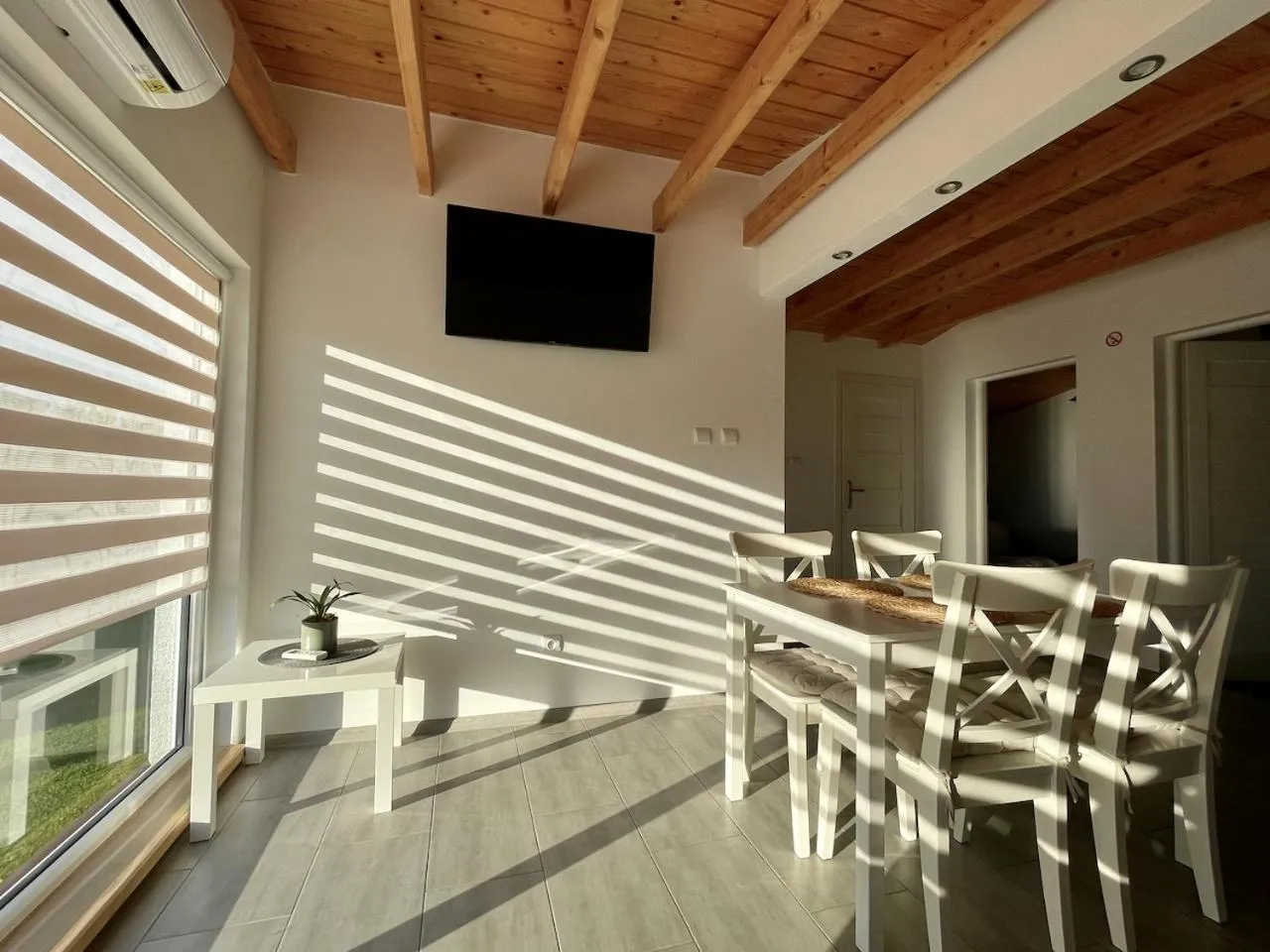 Communal lounge/ TV room in Domki u Grażyny Mikołajki