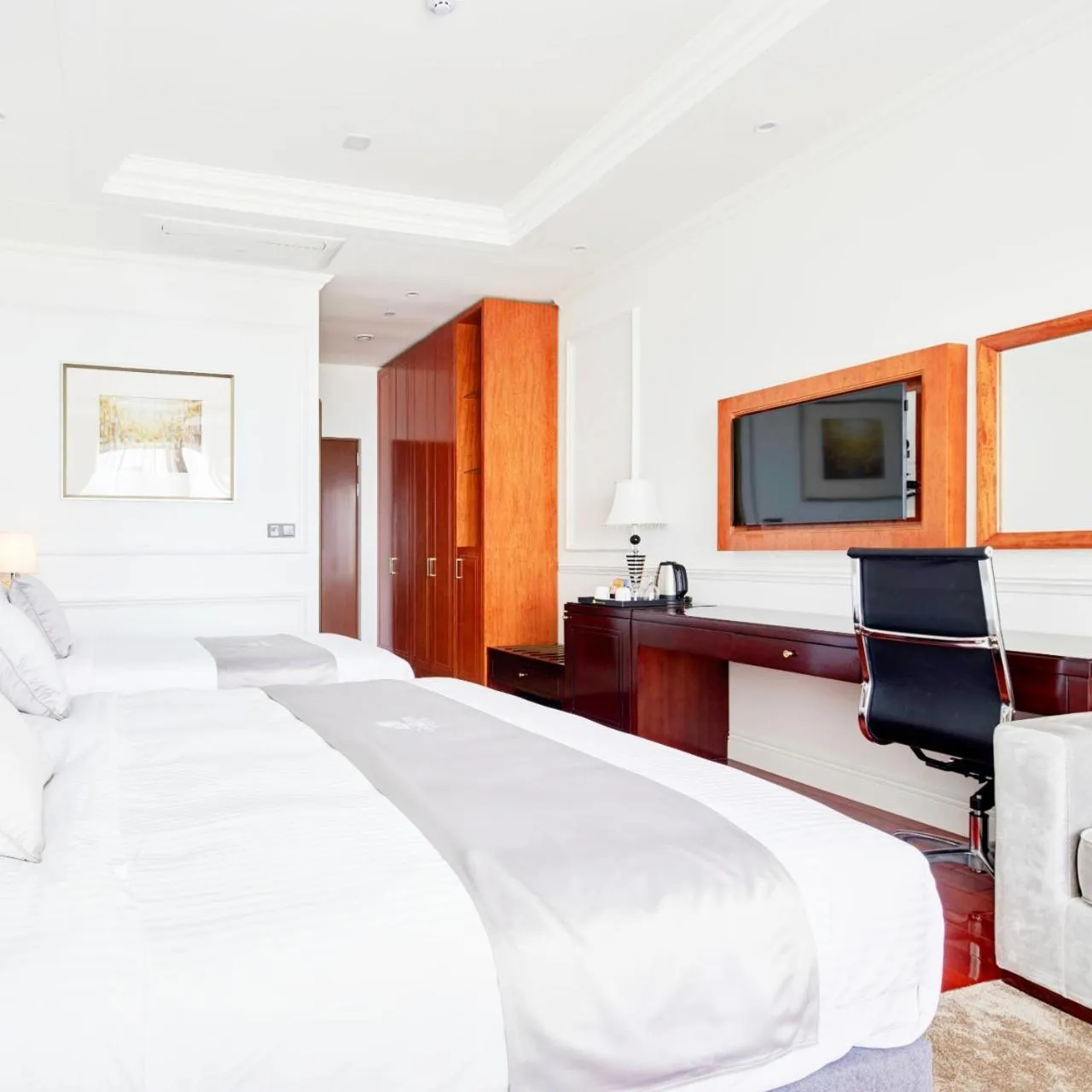 Bed in GoldOne Hotel & Suites