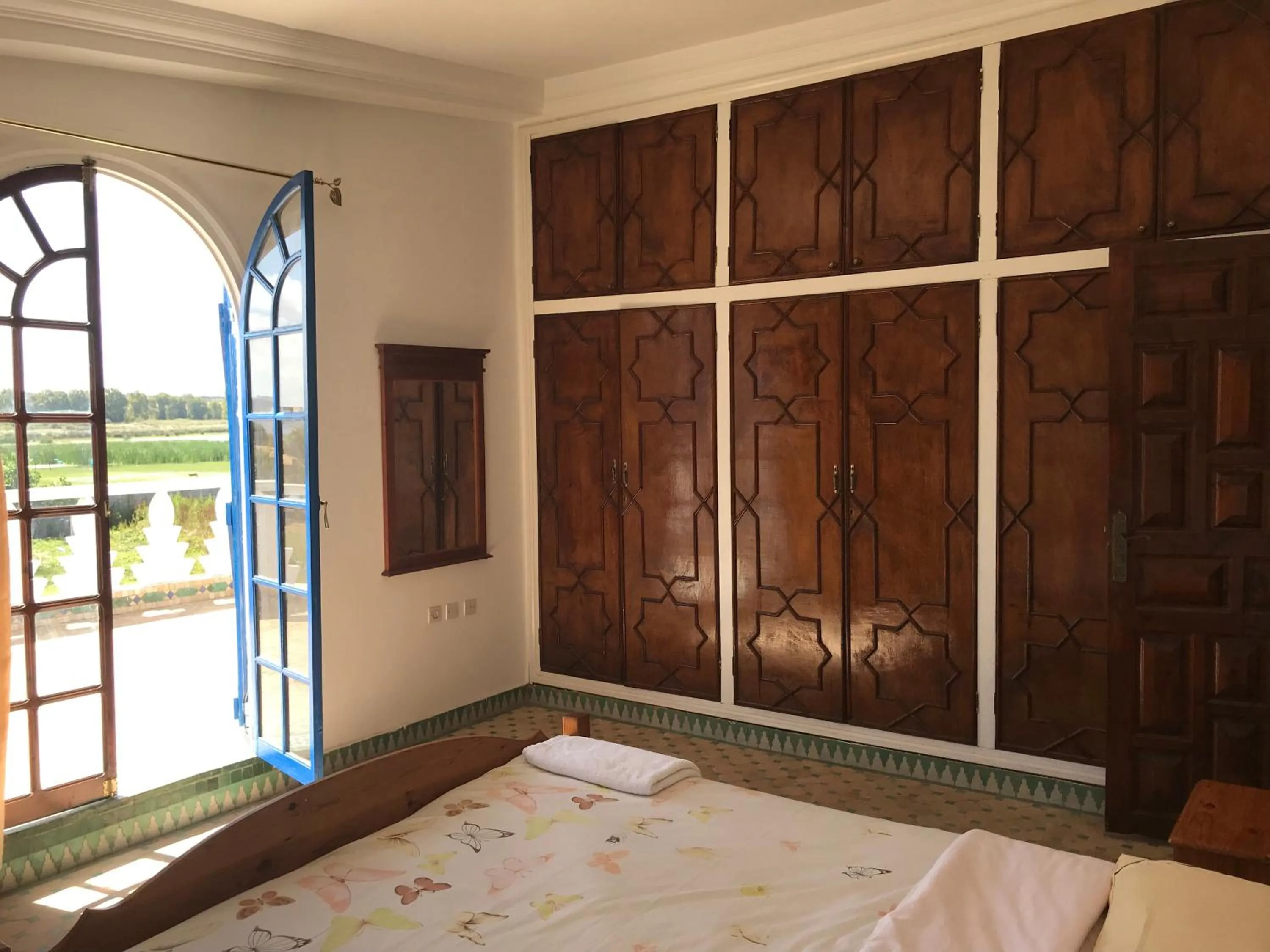 Bed in RIAD DES OISEAUX