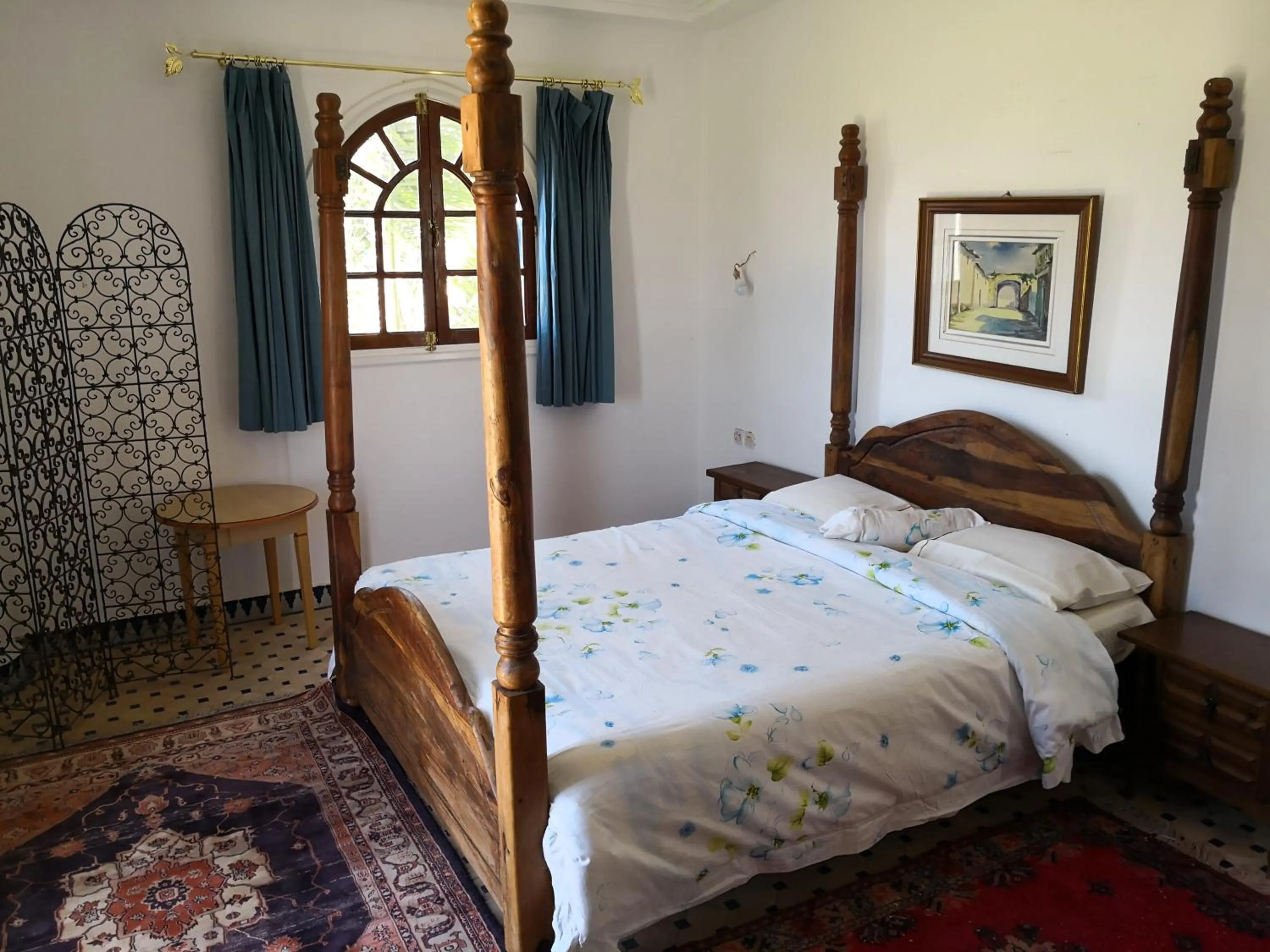 Bed in RIAD DES OISEAUX